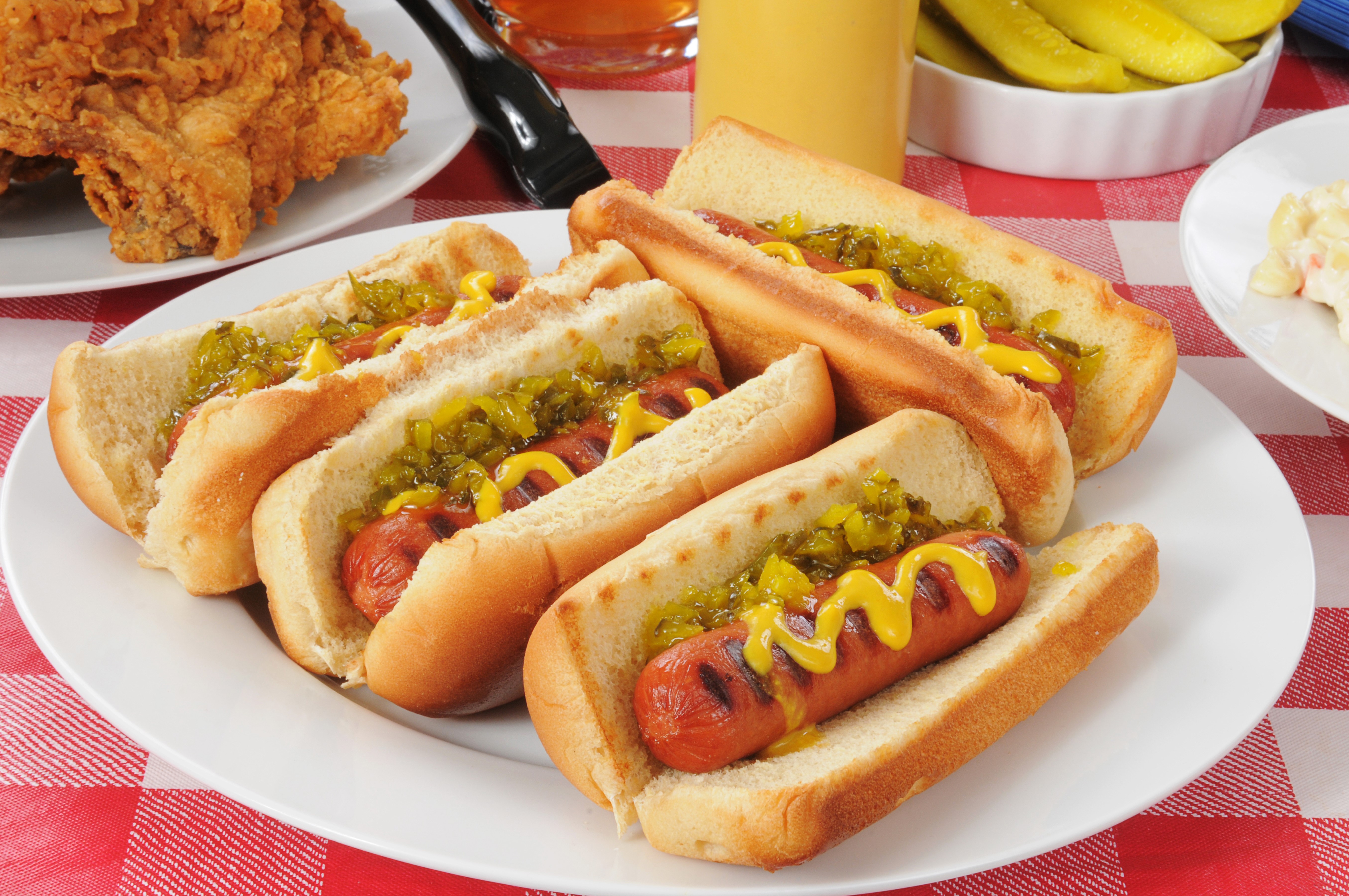 Plate of hot dogs with relish and mustard HD Wallpaper