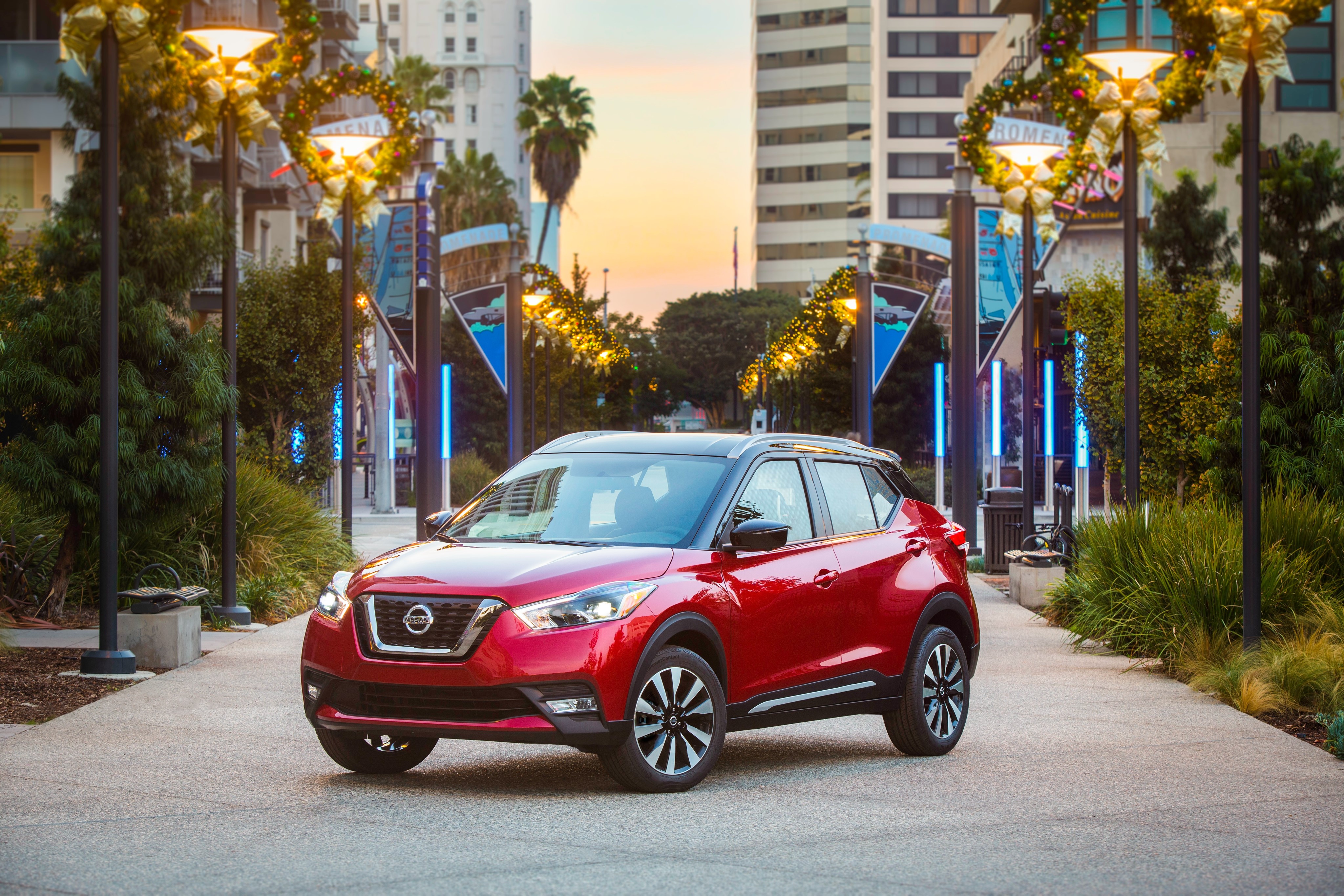Red 2018 Nissan Kicks parked on a street HD Wallpaper