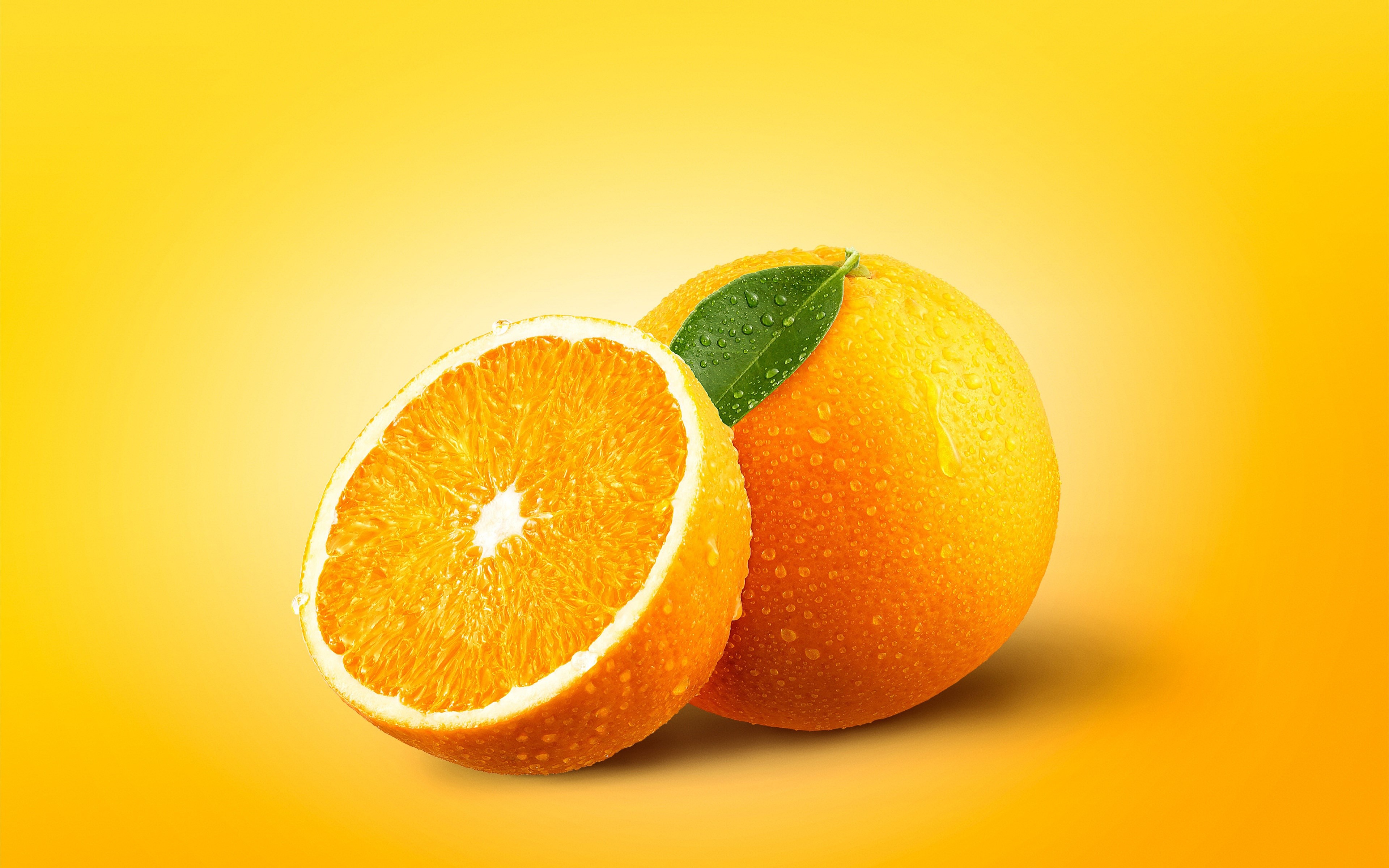 Orange fruit with water drops and leaf HD Wallpaper