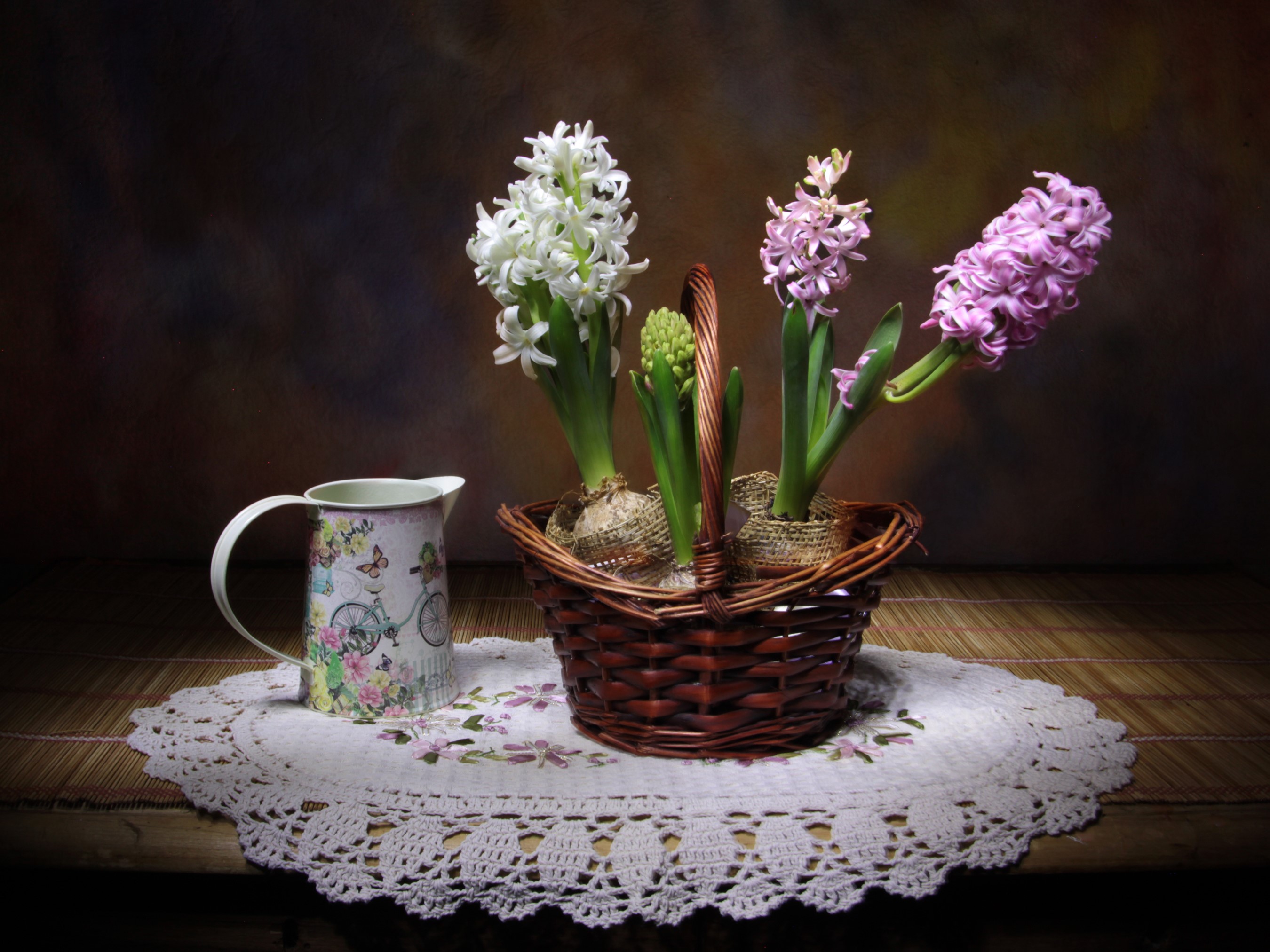Hyacinths in a wicker basket with a pitcher HD Wallpaper