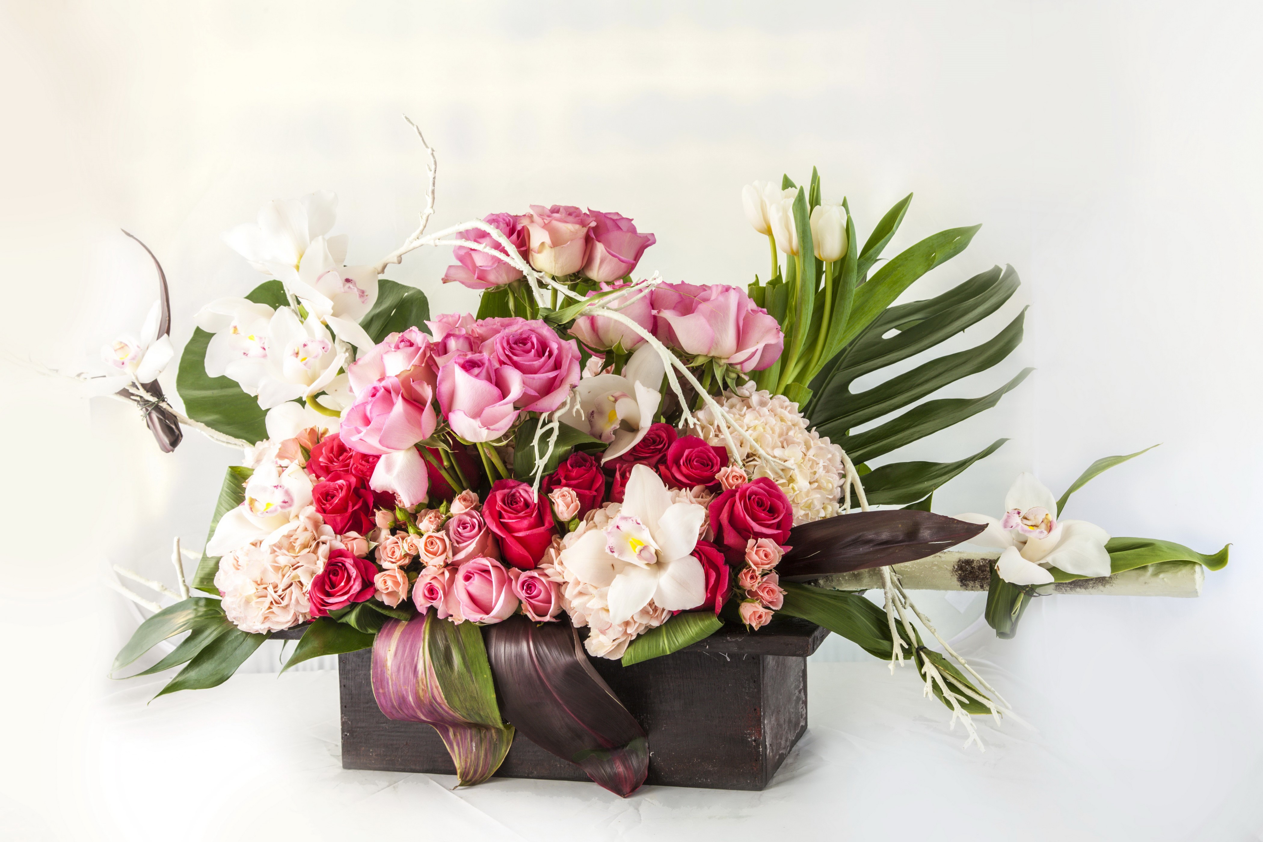 Roses, Orchids, and Tulips in a Floral Arrangement HD Wallpaper