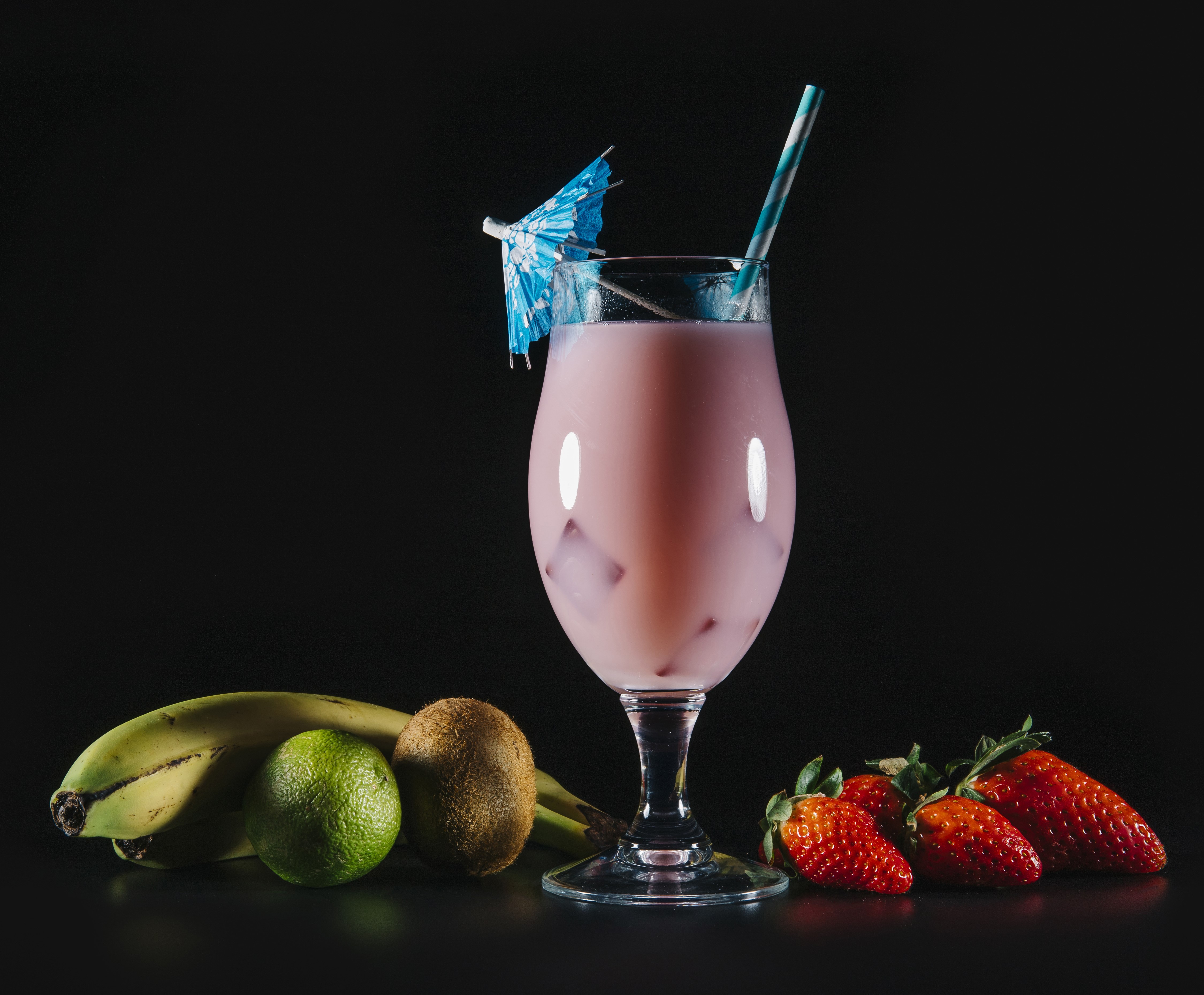 Cocktail with Strawberries, Bananas, Kiwi, and Lime HD Wallpaper