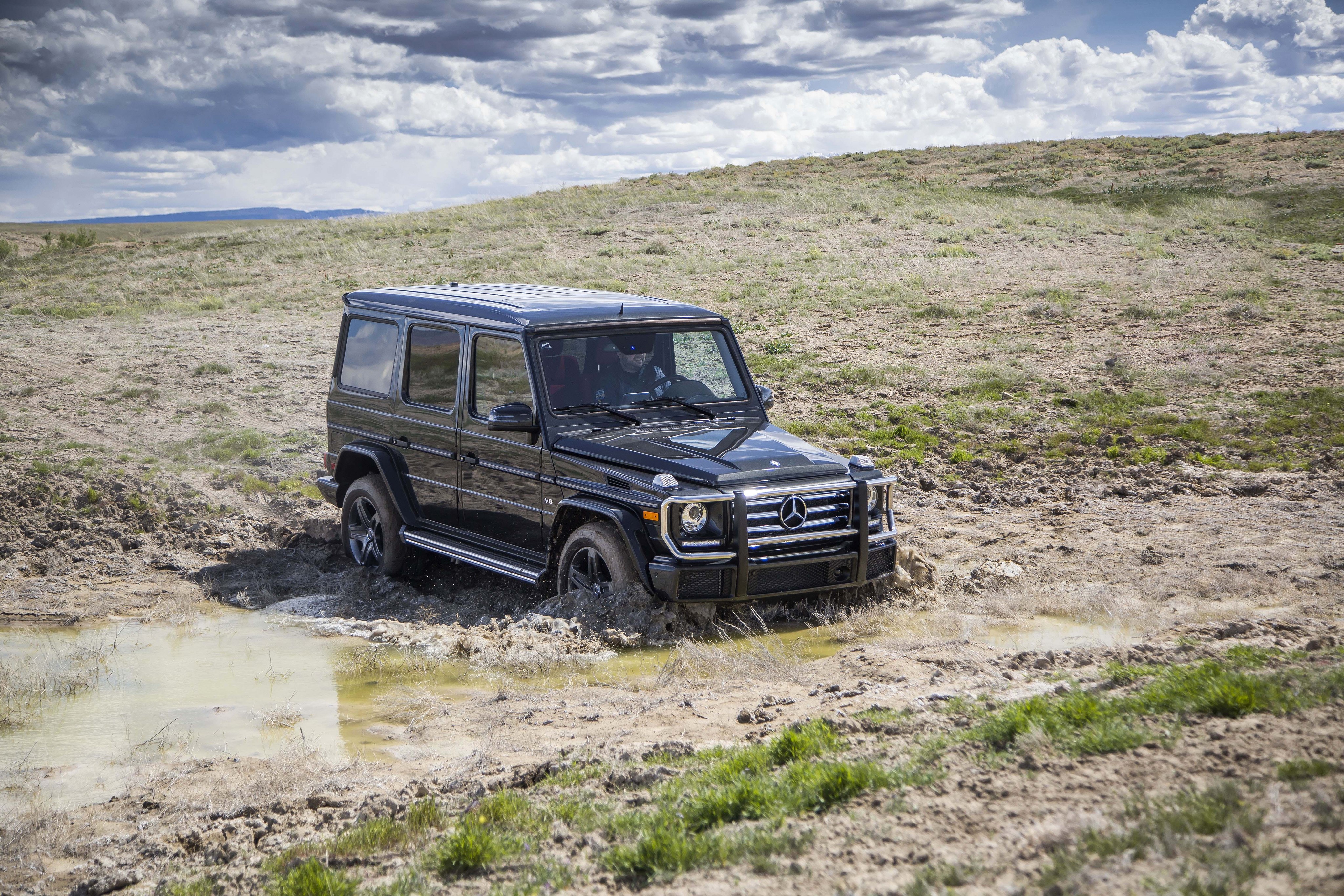 Black 2016 Mercedes-Benz G 550 off-roading HD Wallpaper