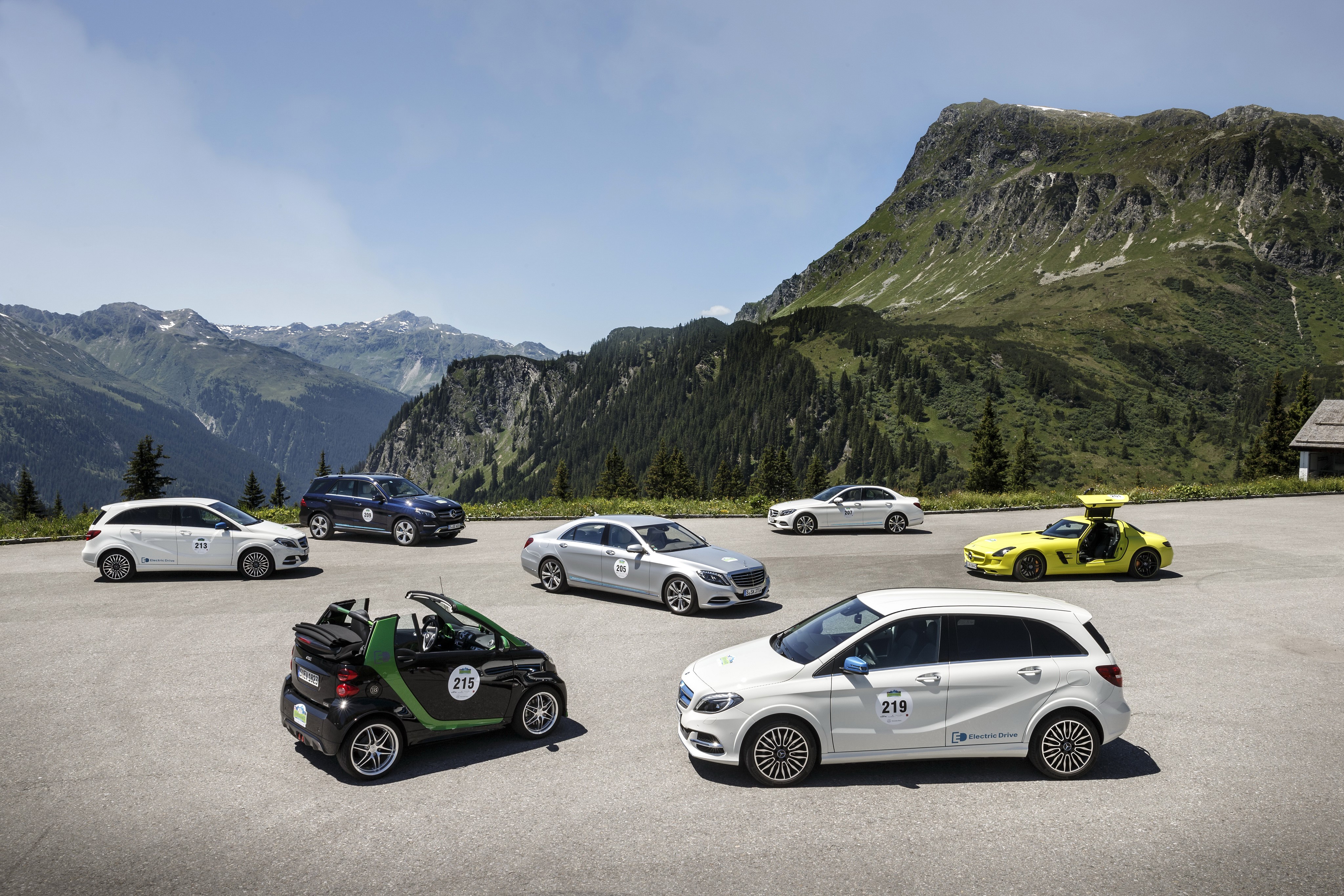 Mercedes-Benz and Smart cars on a mountain road HD Wallpaper