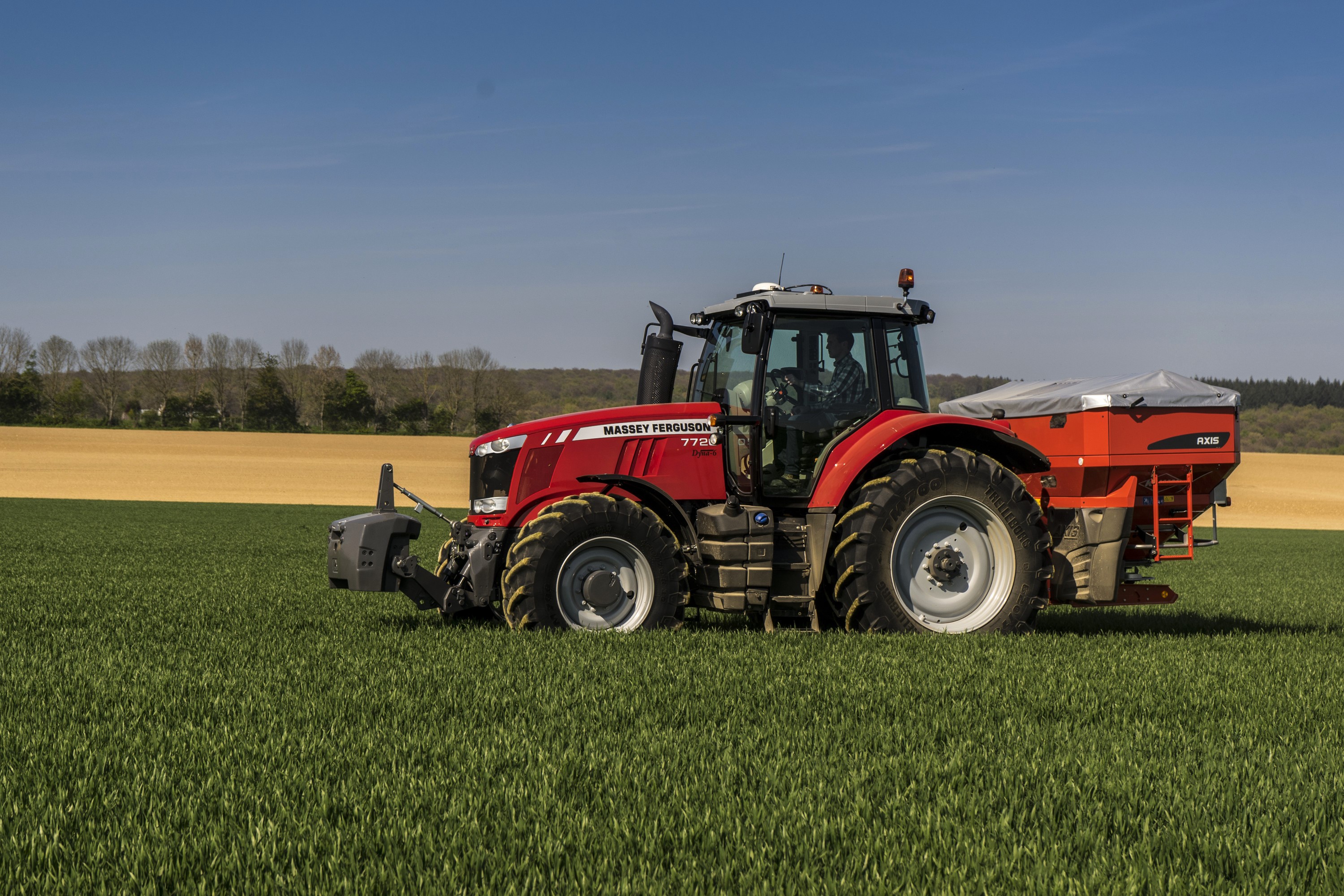 Massey Ferguson 7720 tractor in a field HD Wallpaper