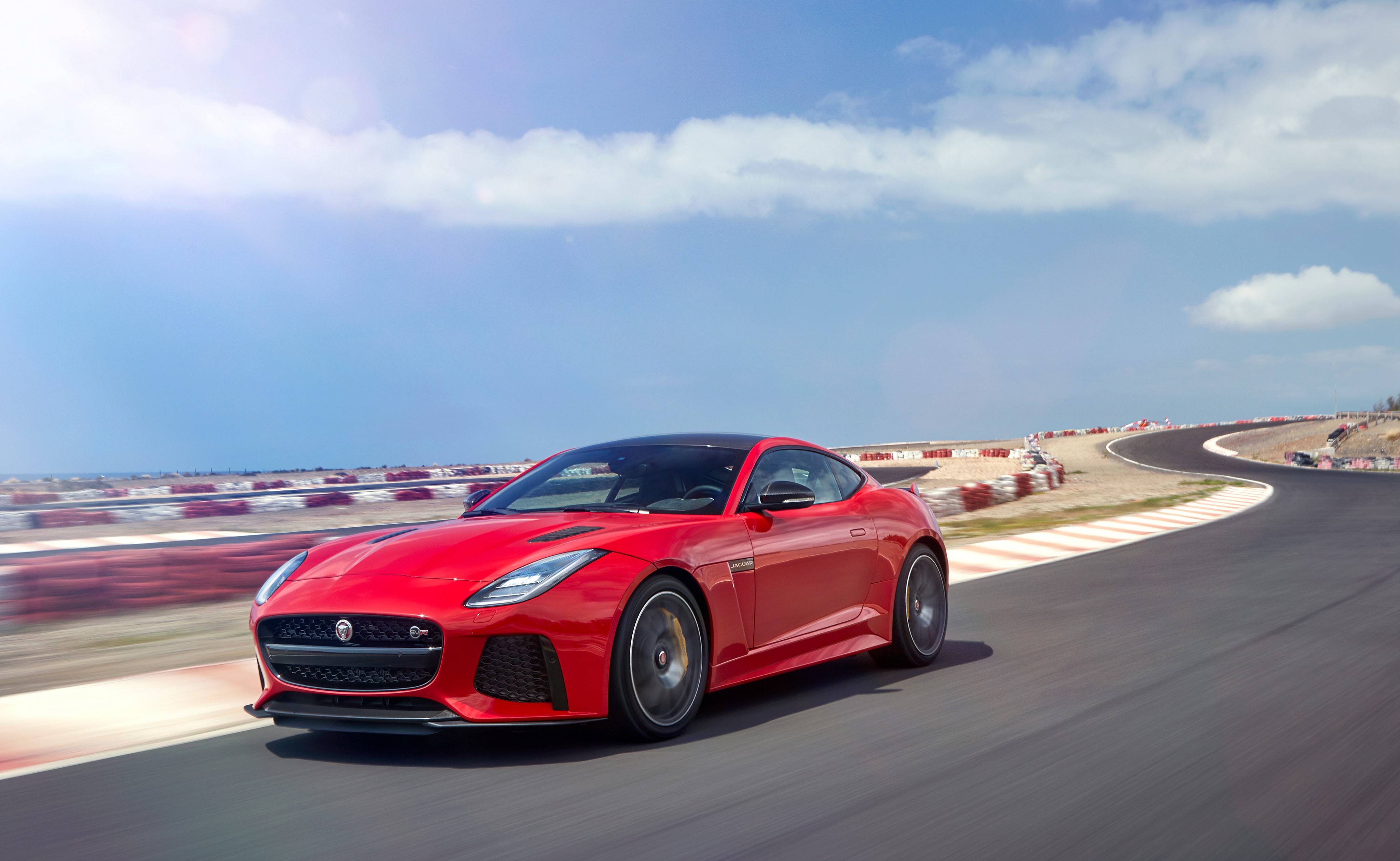 Red Jaguar F-Type on a Racetrack HD Wallpaper