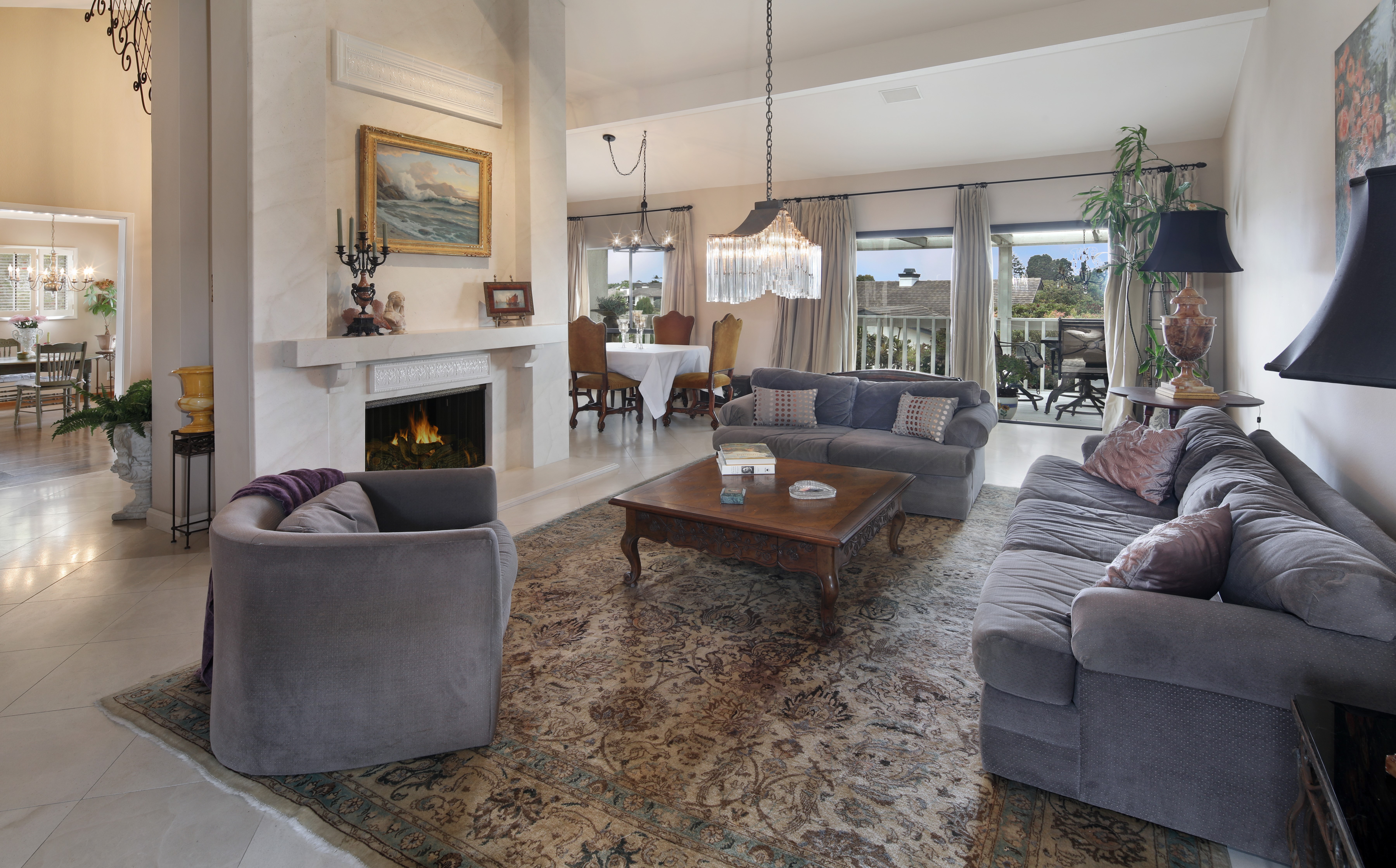 Living room with sofas, armchair, and fireplace HD Wallpaper