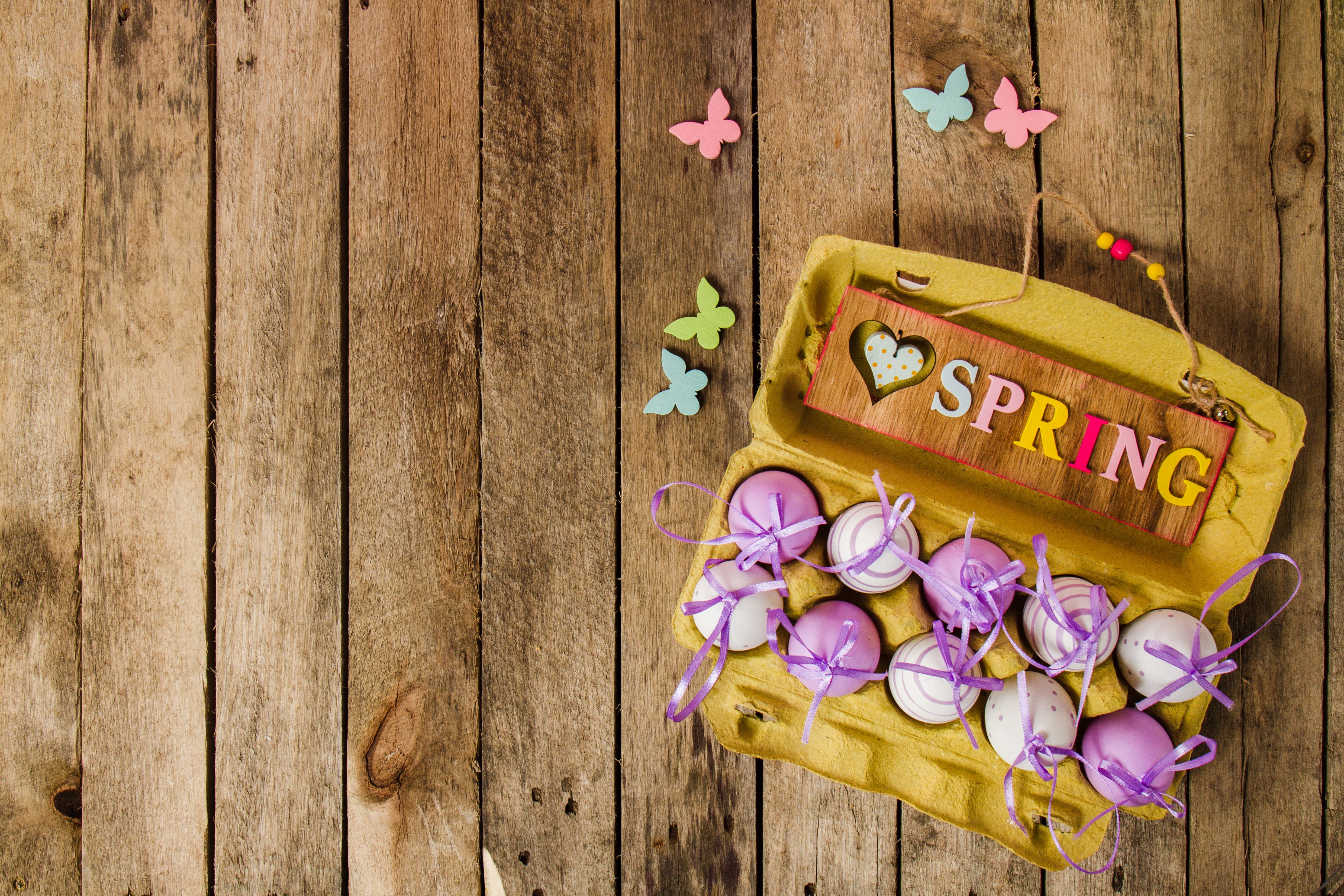 Easter eggs in a carton with a Spring sign HD Wallpaper