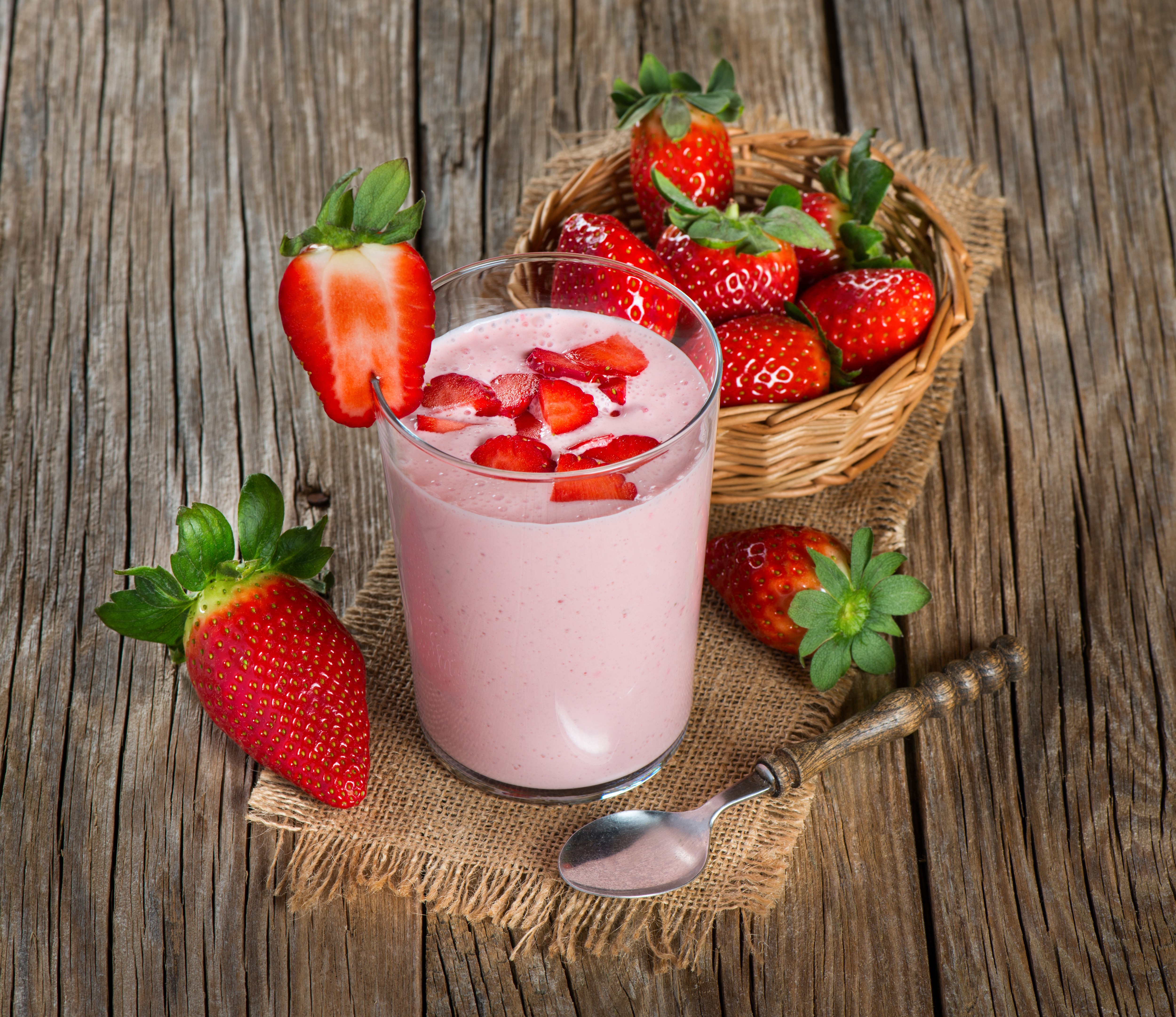 Strawberry smoothie in a glass with fresh strawberries HD Wallpaper
