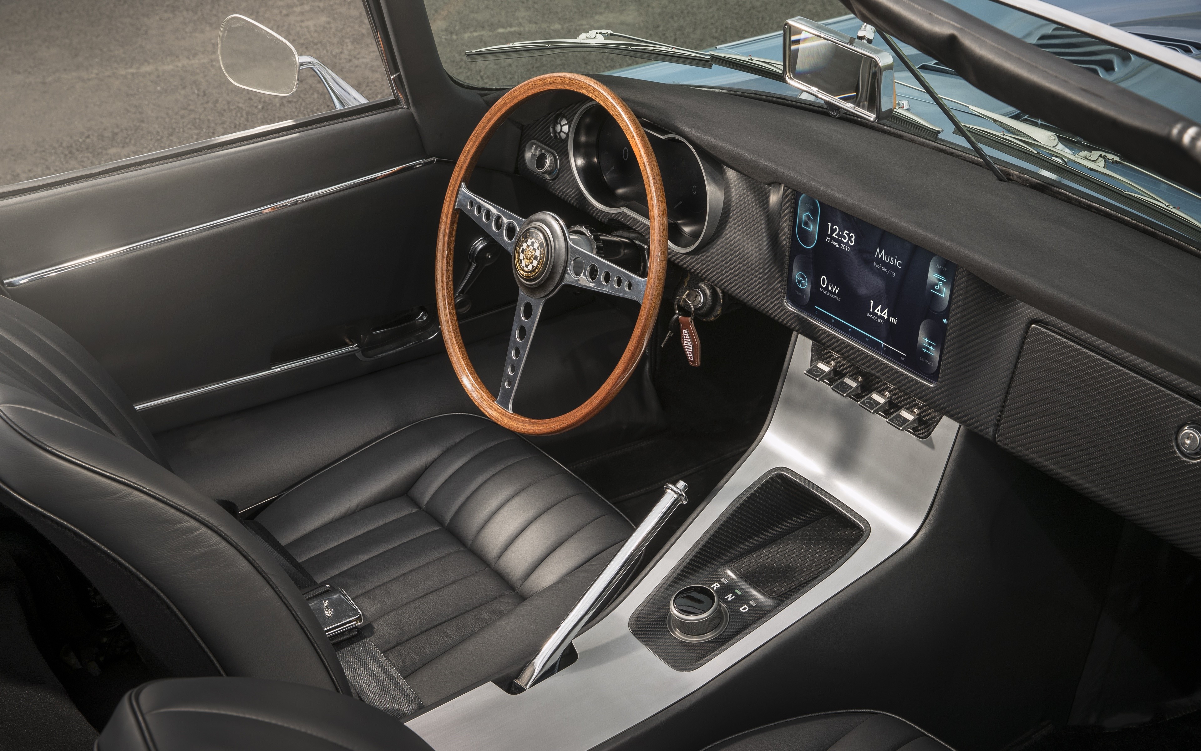 Interior of a 2017 Jaguar E-type Zero concept car HD Wallpaper