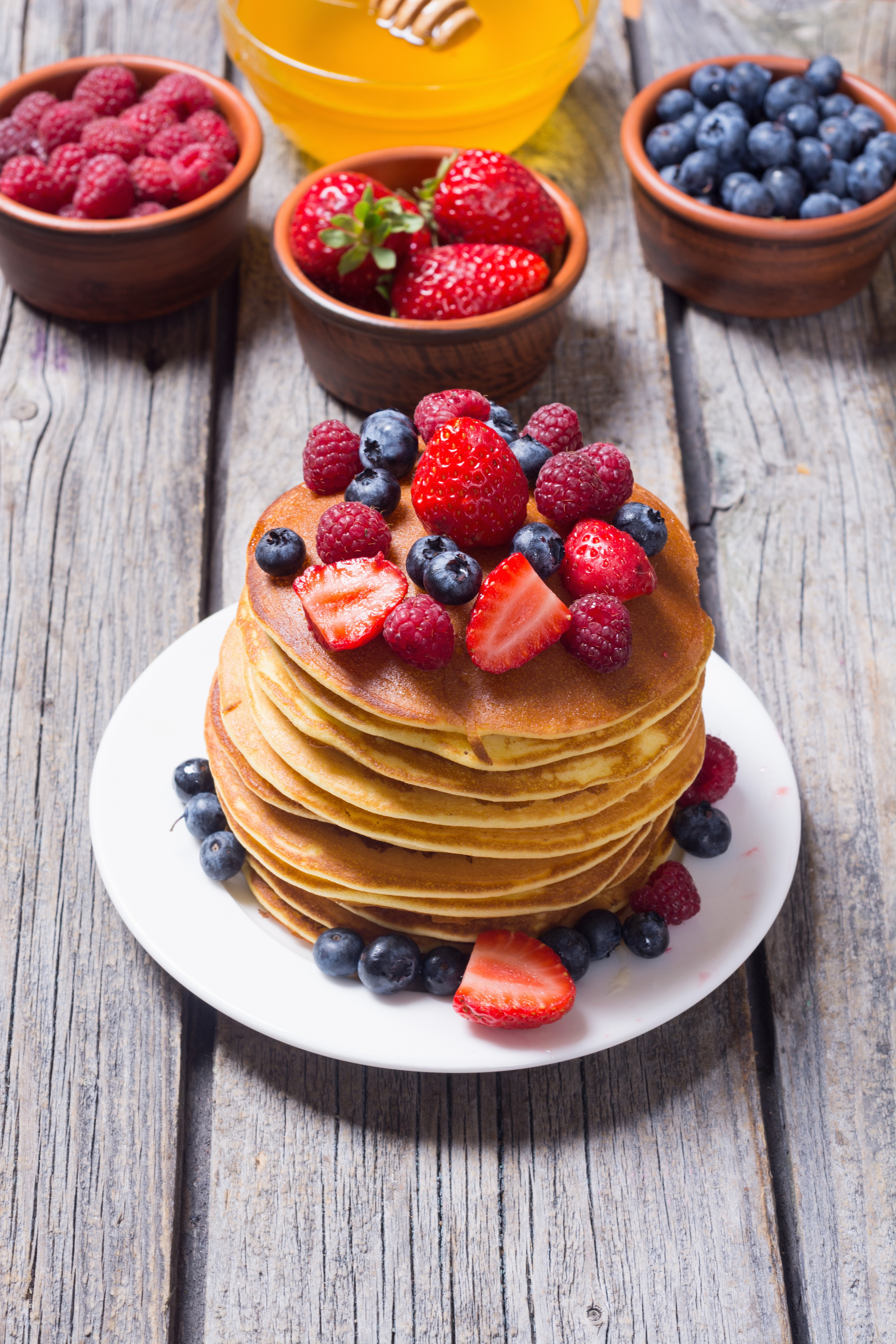Pancakes with Strawberries, Raspberries, and Blueberries on a Plate HD Phone Wallpaper