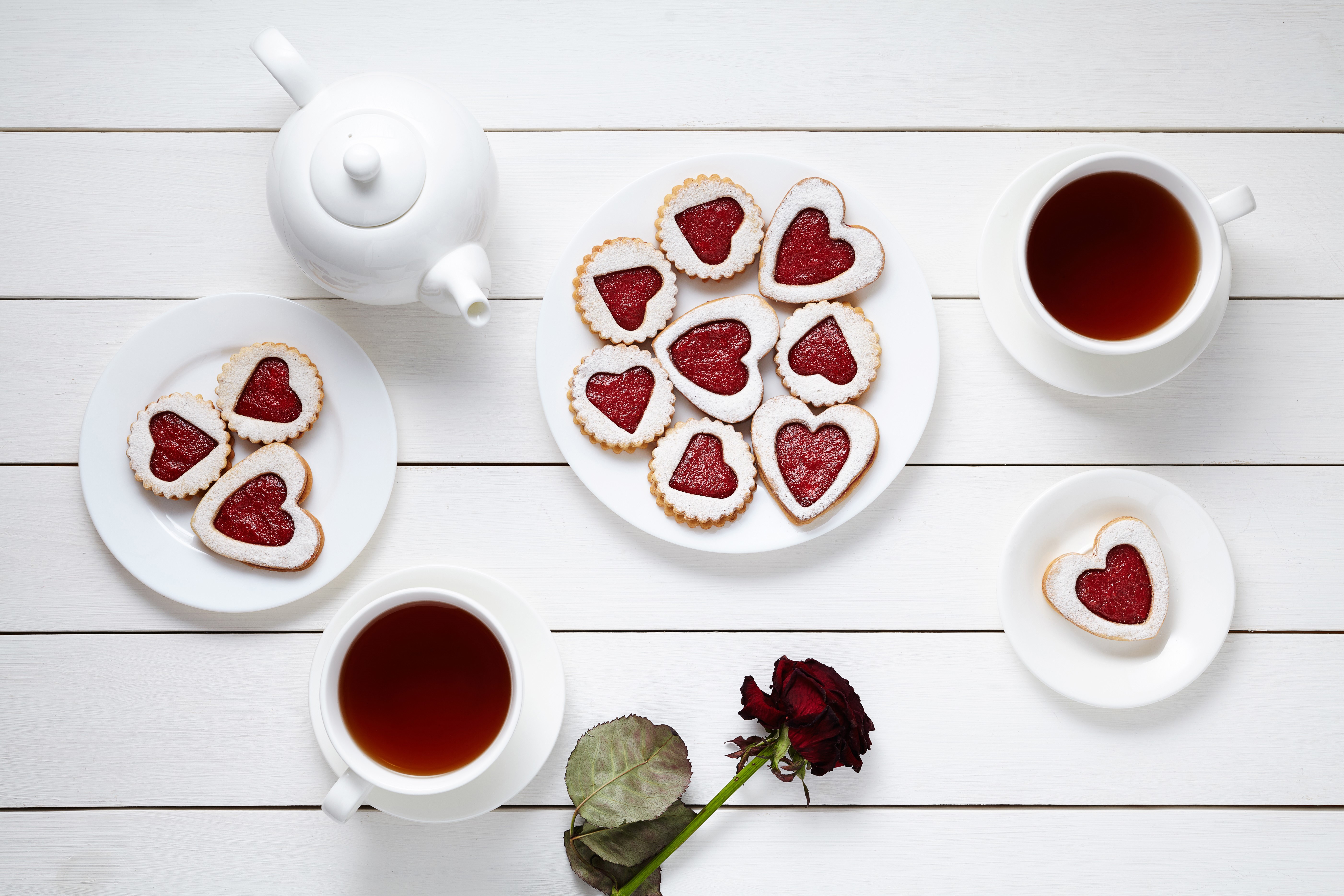 Tea set with heart-shaped cookies and a rose HD Wallpaper