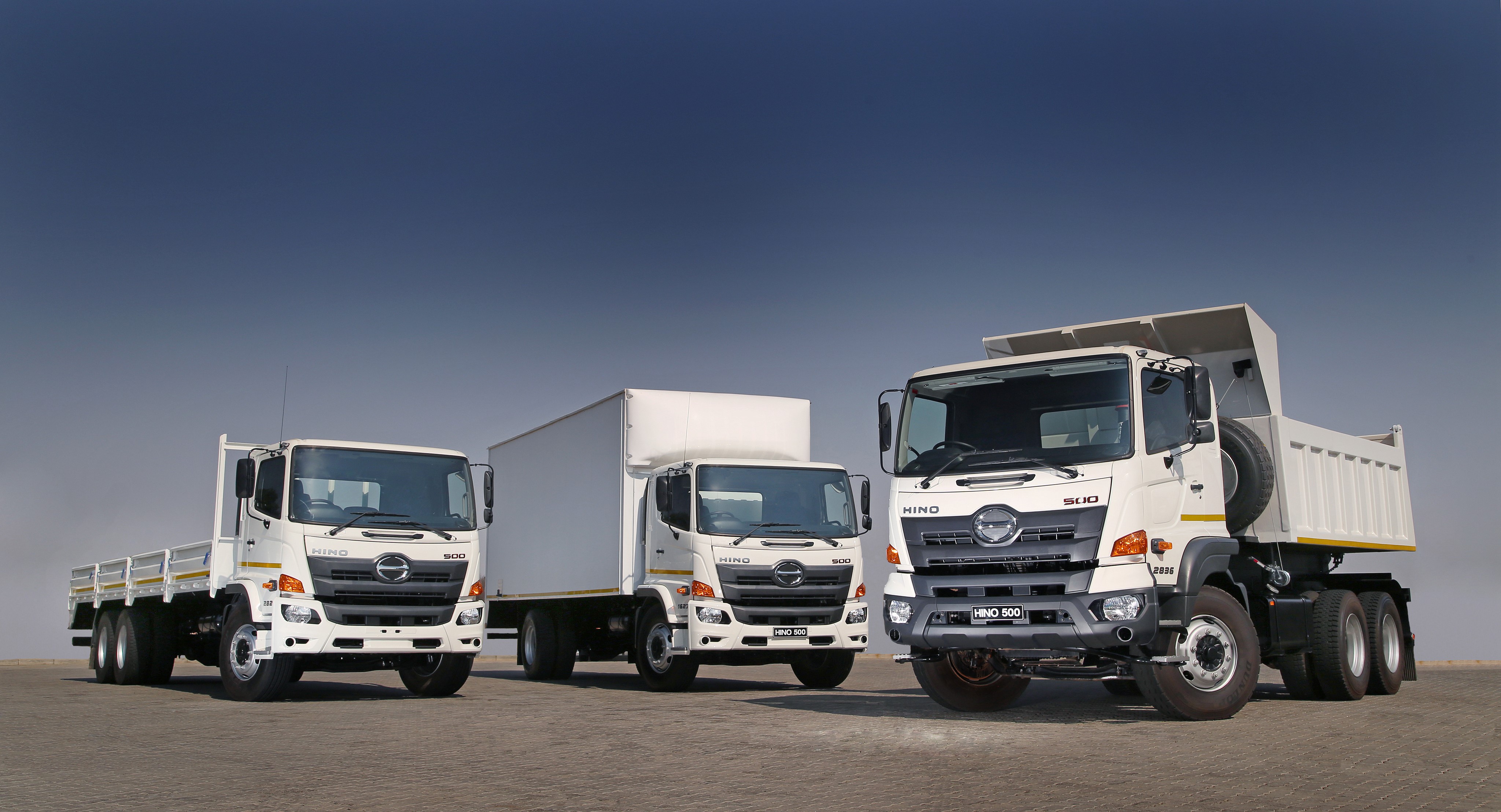 Three White Hino Trucks HD Wallpaper