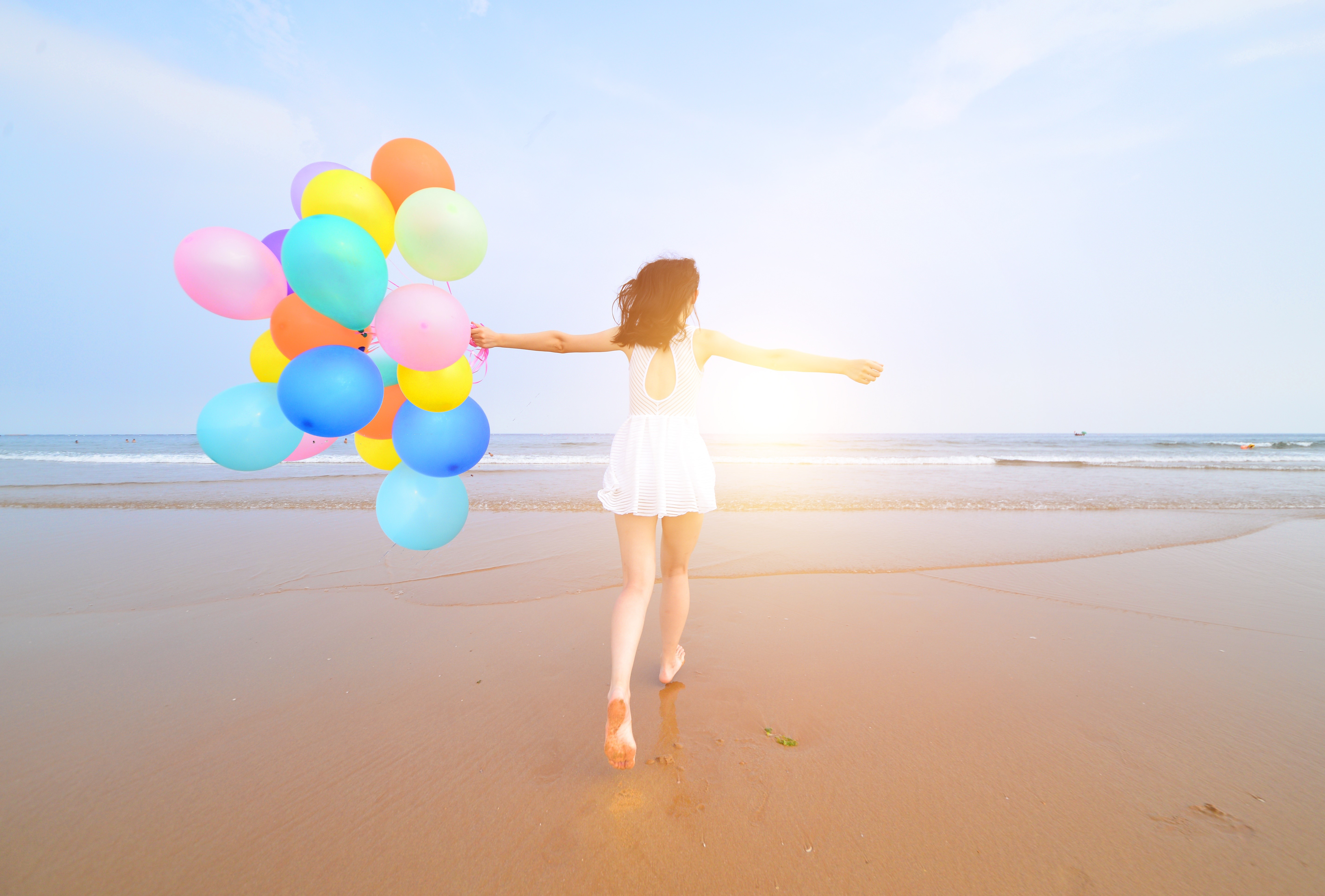 Girl with Balloons on the Beach HD Wallpaper