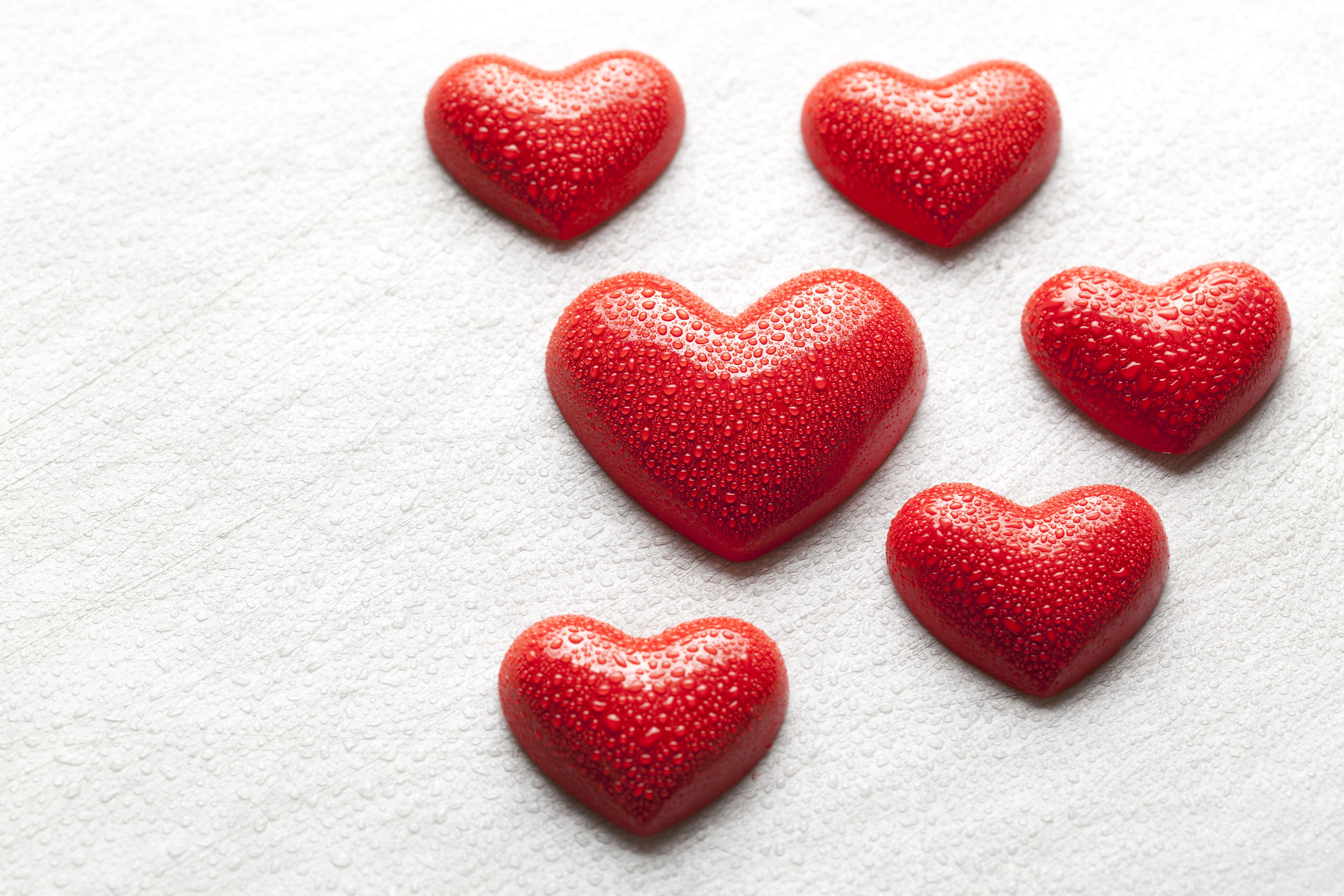 Red Hearts with Water Drops on White Background HD Wallpaper