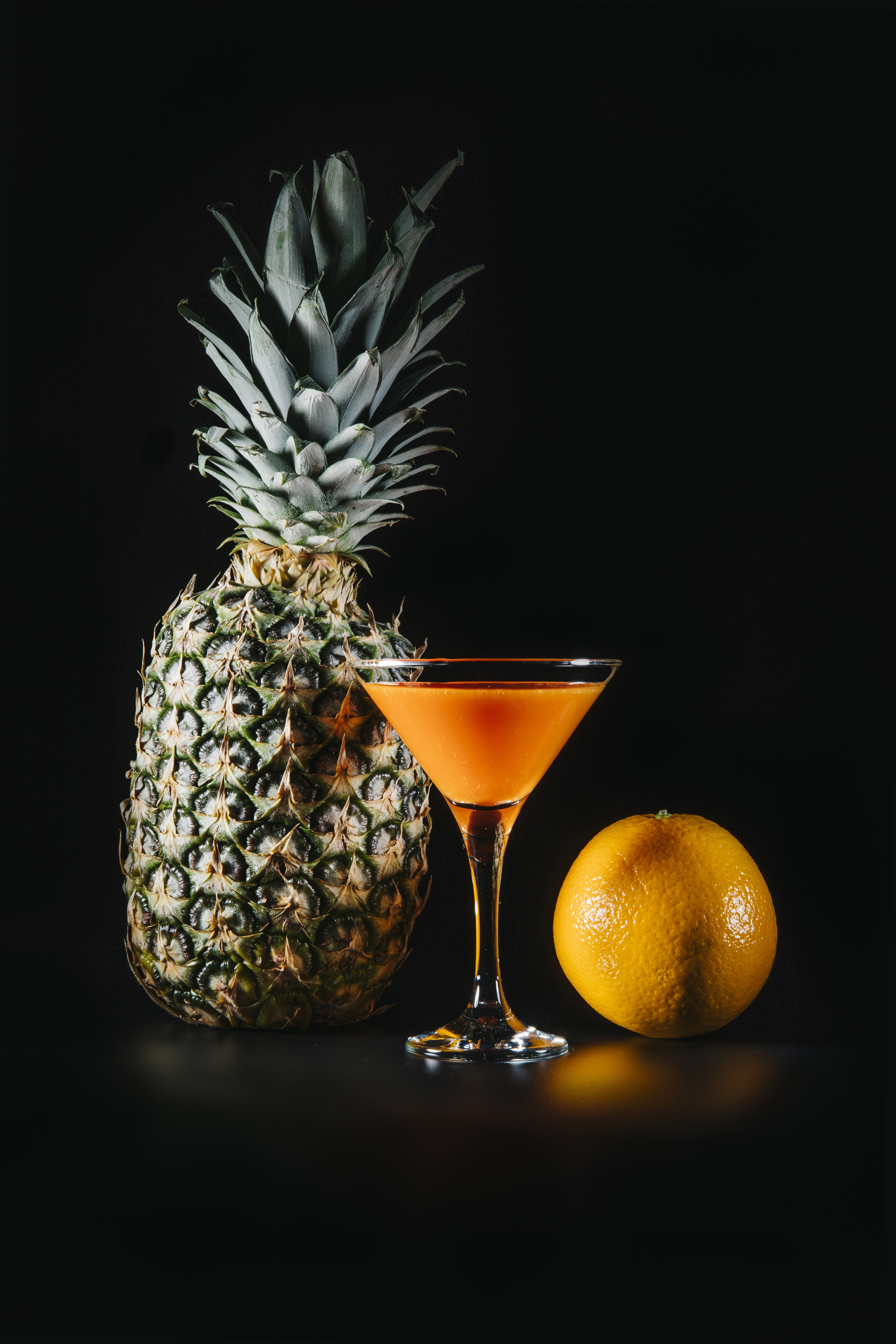 Pineapple, Orange, and Juice in Martini Glass HD Phone Wallpaper