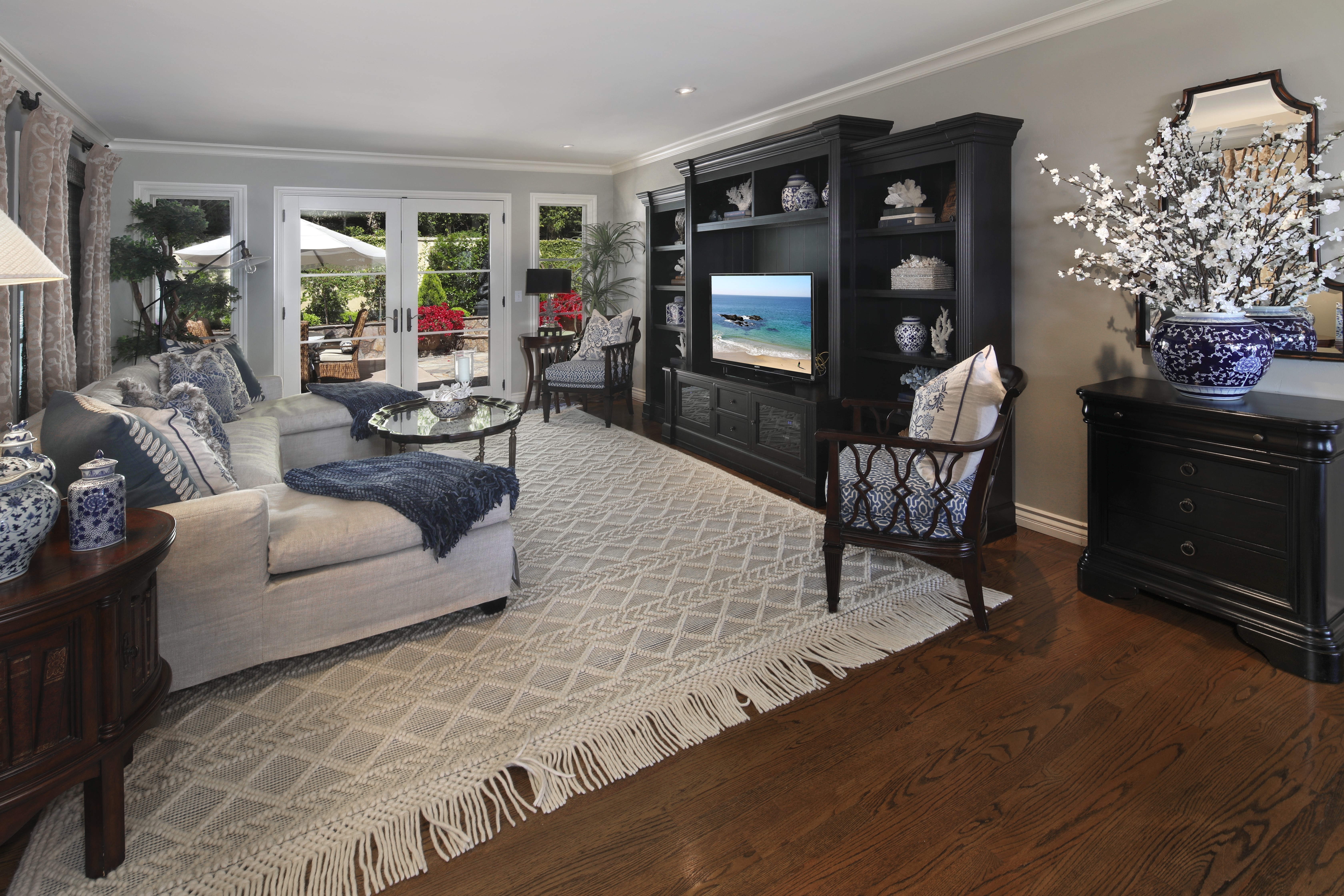 Living room with sofa and entertainment center HD Wallpaper
