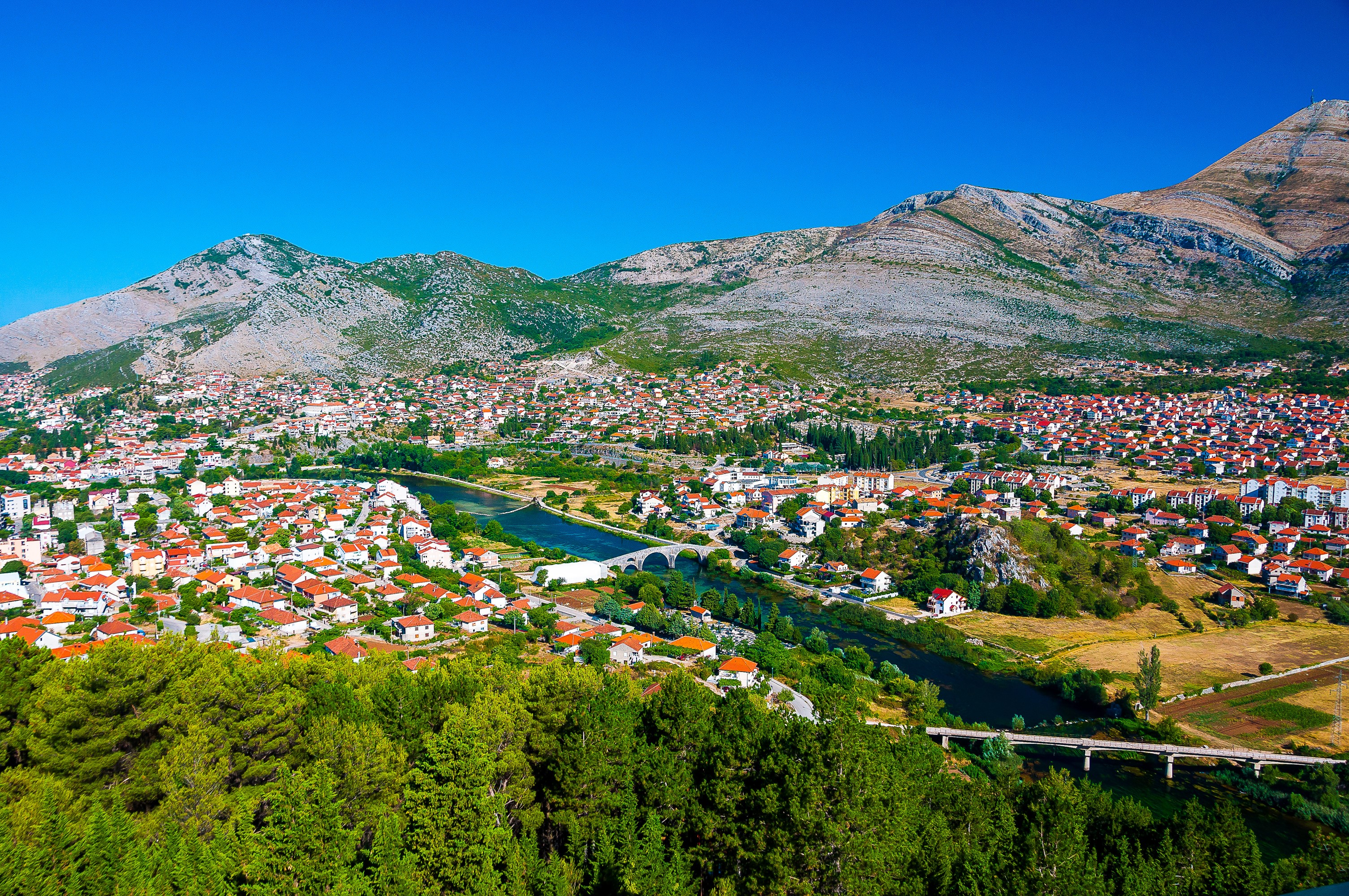 Trebinje, Bosnia and Herzegovina with river and mountains HD Wallpaper
