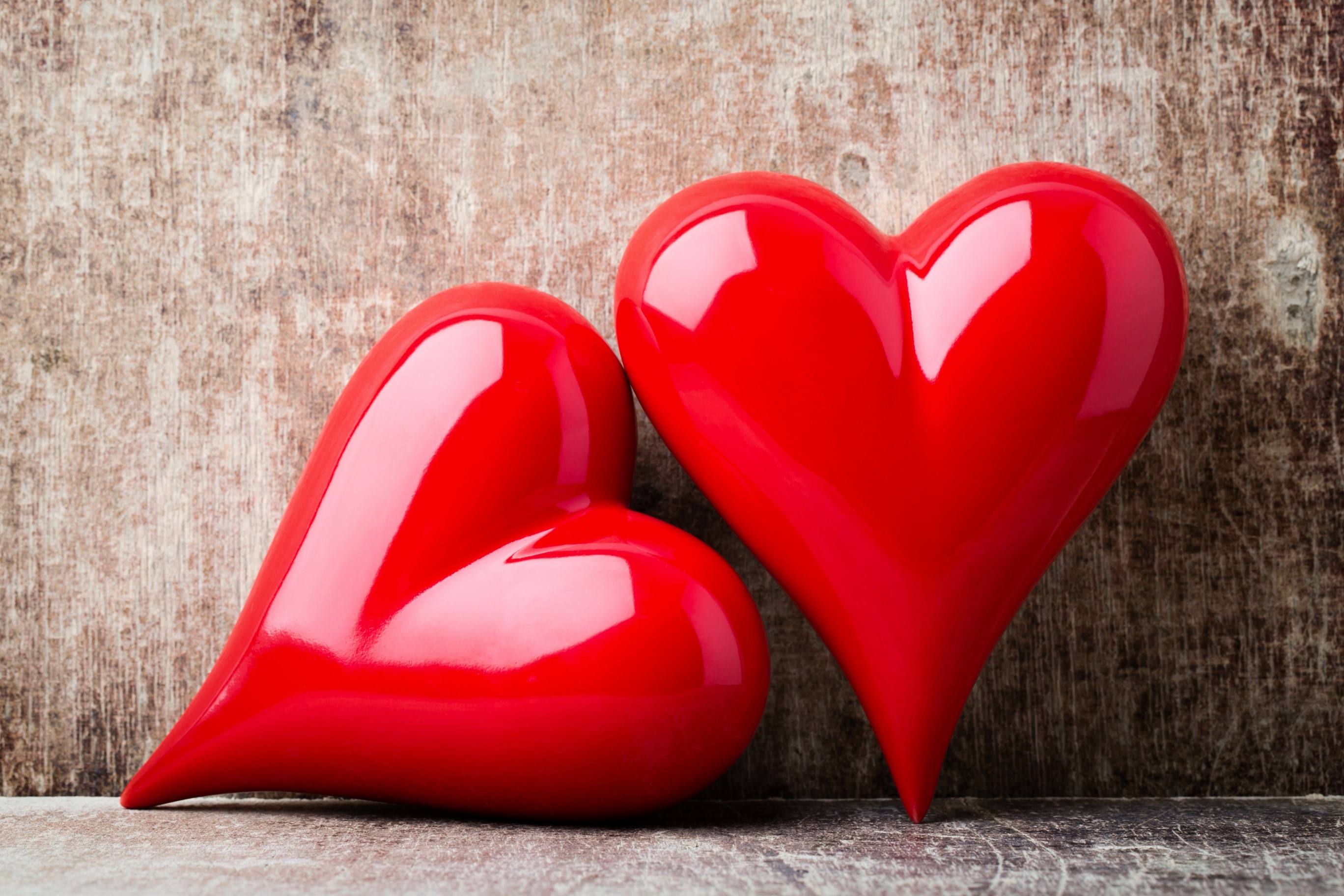Two red hearts on a wooden background HD Wallpaper