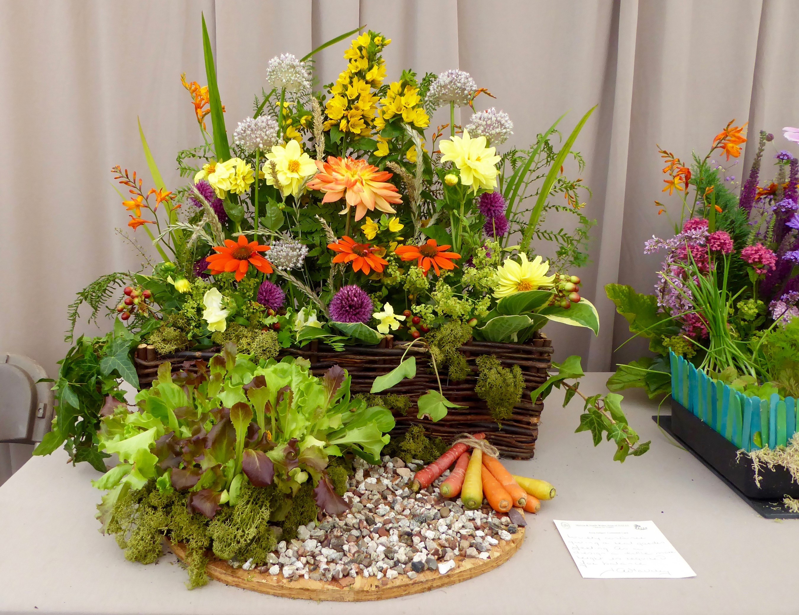 Flower arrangement with dahlias and carrots HD Wallpaper