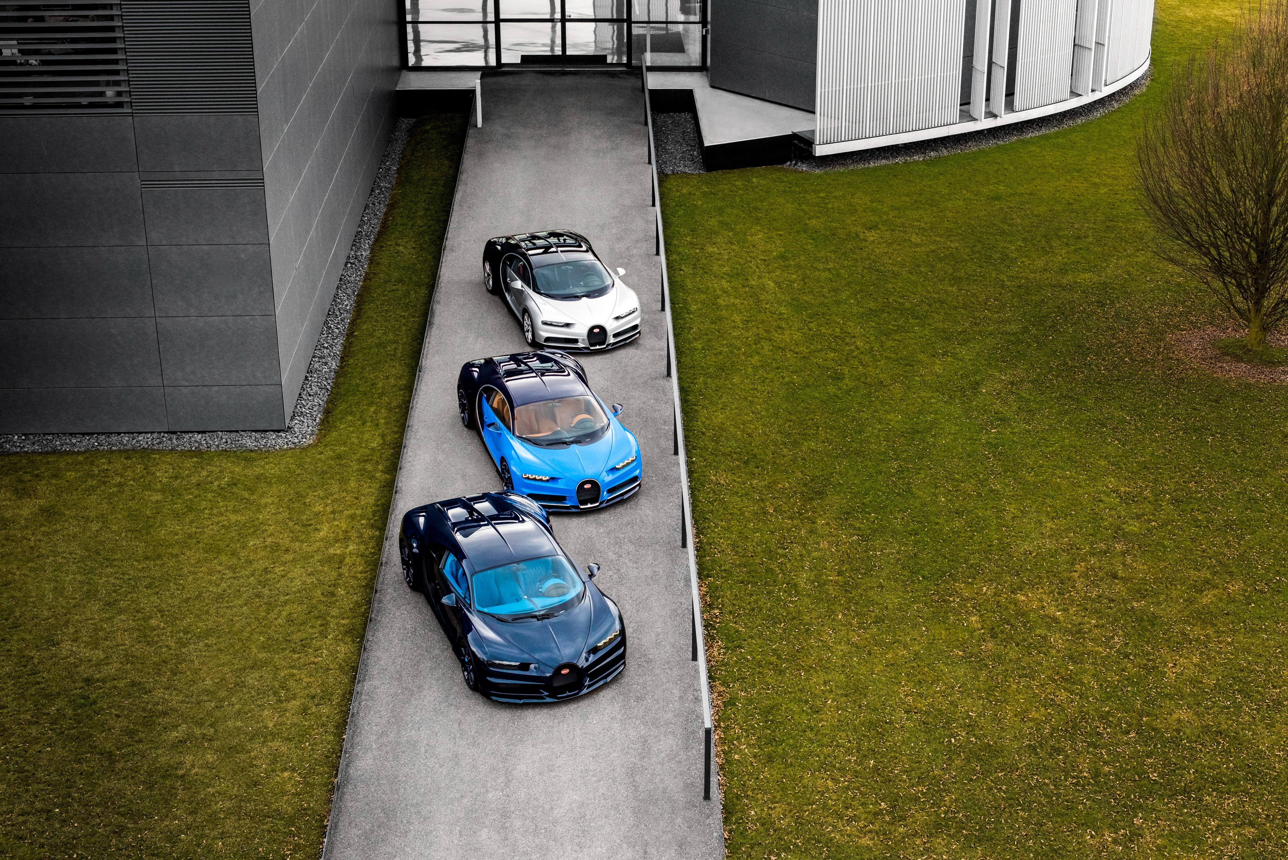 Three Bugatti Chiron cars from above HD Wallpaper