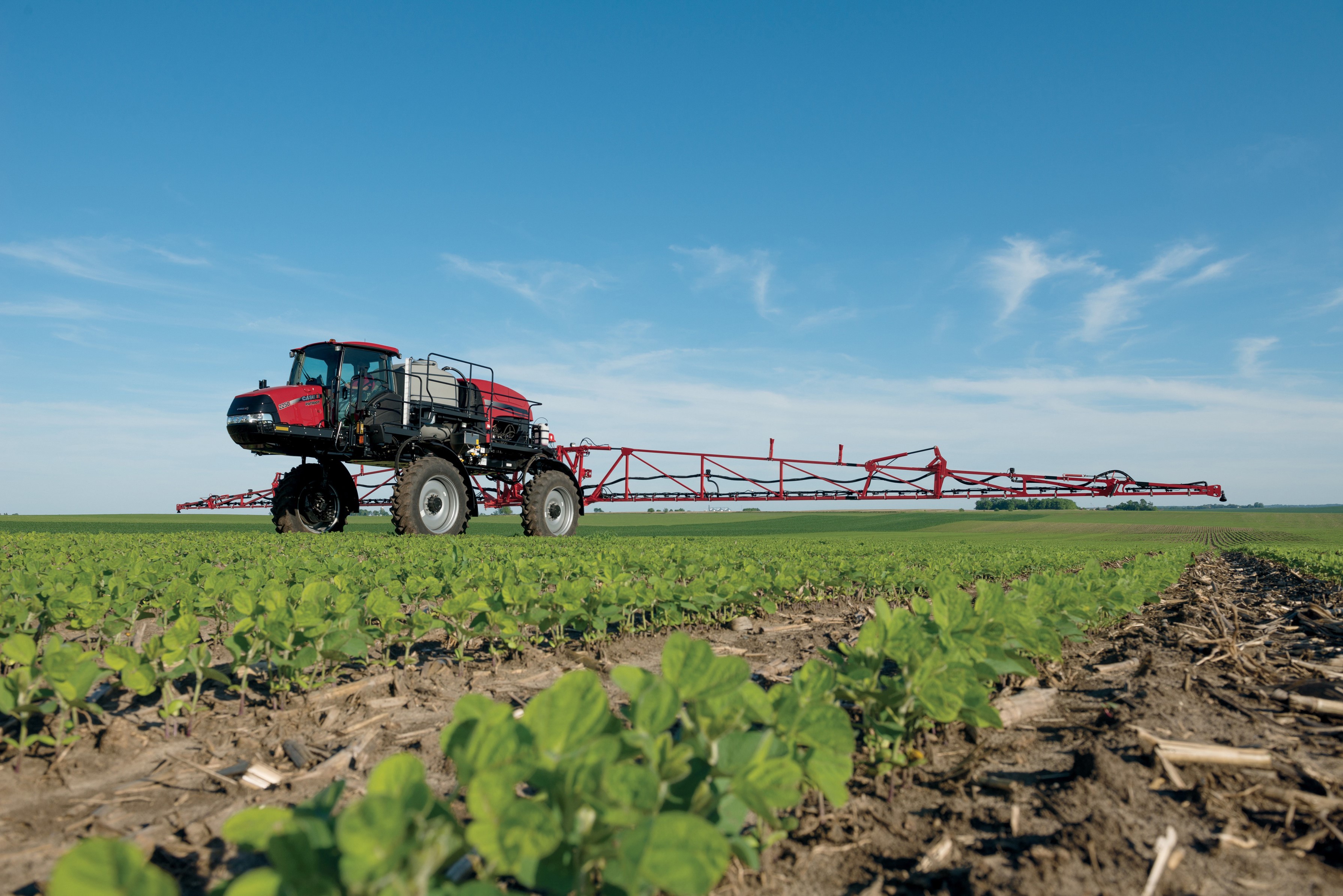 Case IH Patriot 2250 Sprayer in a Field HD Wallpaper