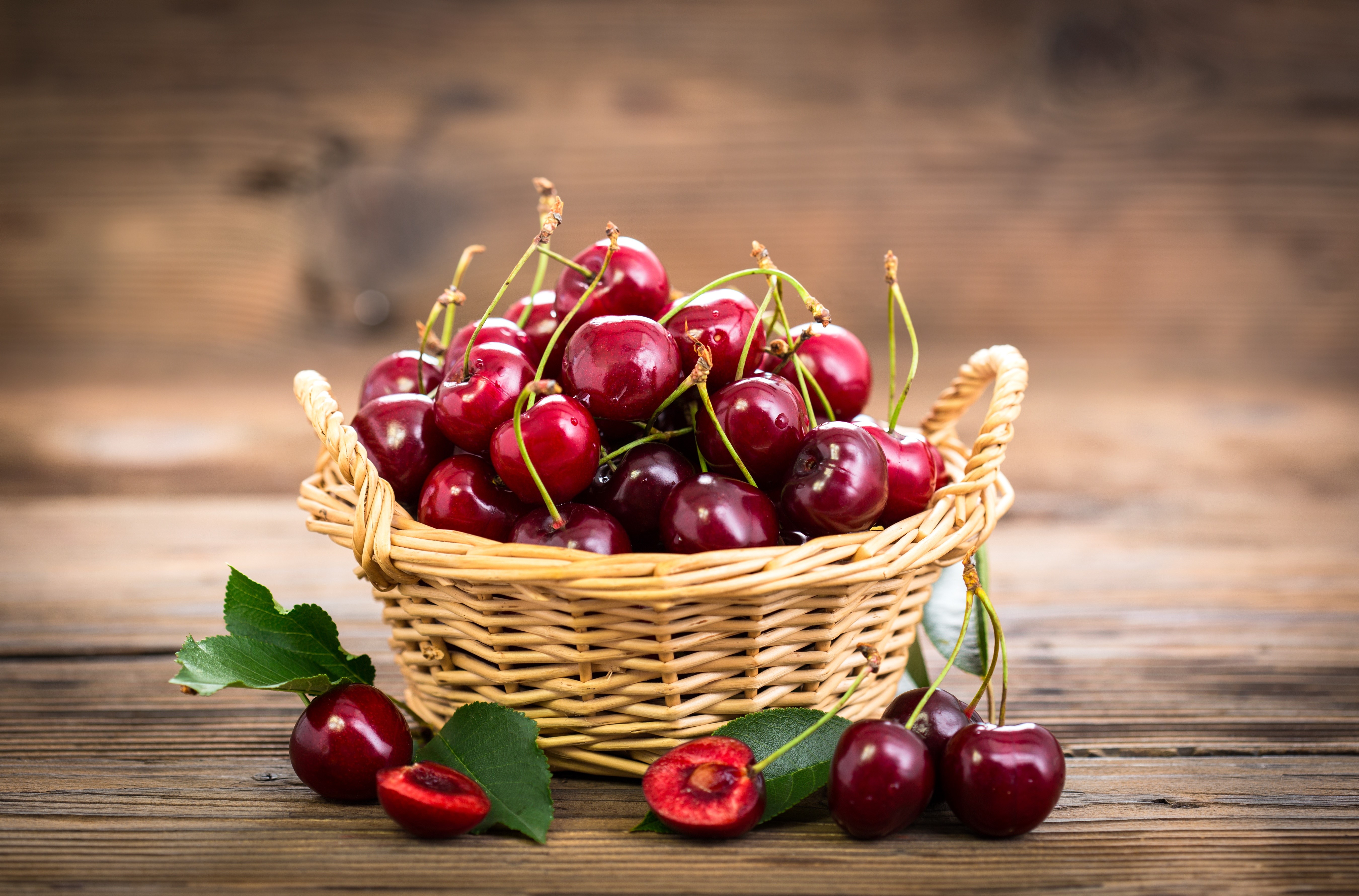 Cherries in a wicker basket HD Wallpaper