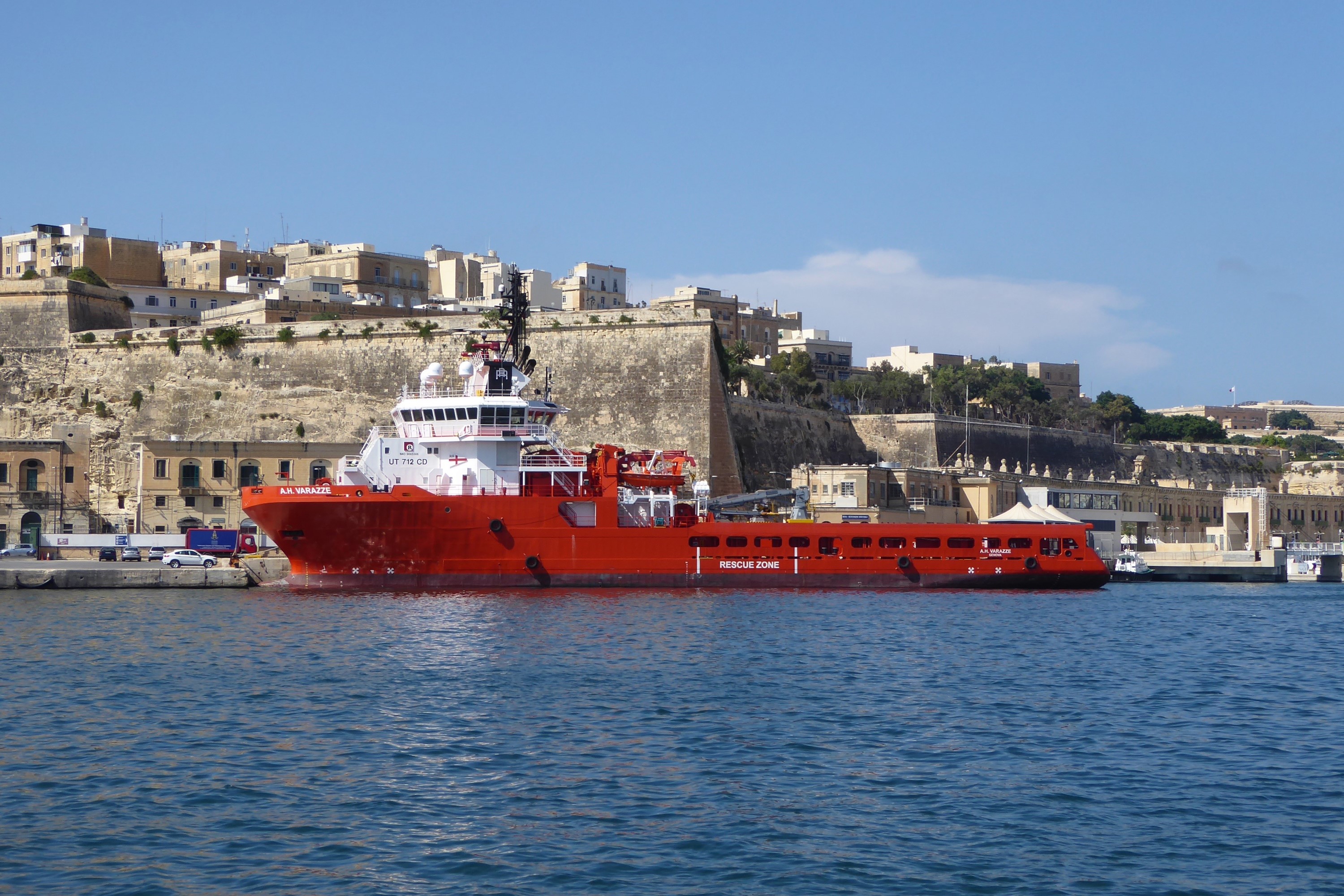 Red rescue ship docked in Valletta, Malta HD Wallpaper