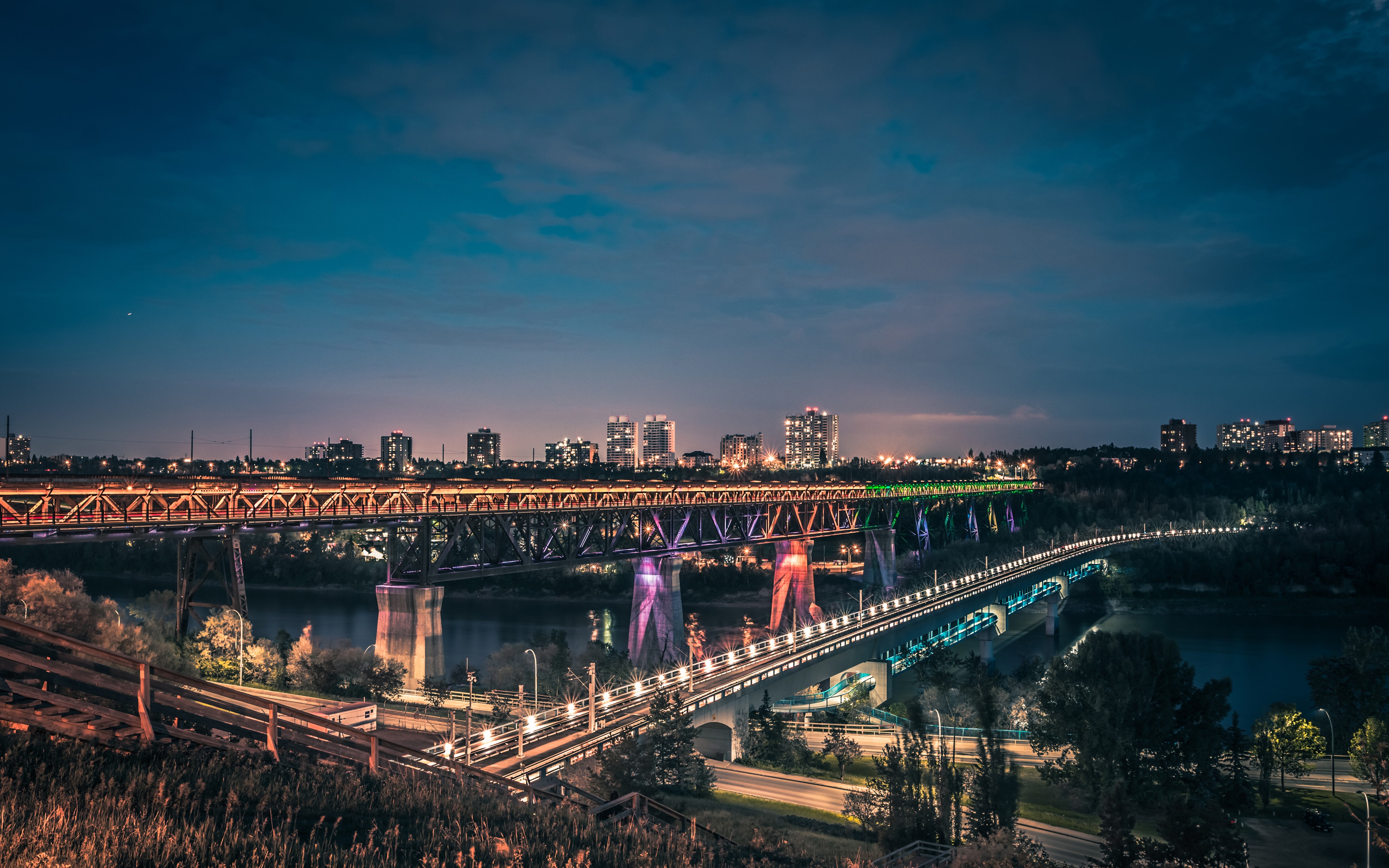 Bridges over river in Edmonton, Alberta at night HD Wallpaper