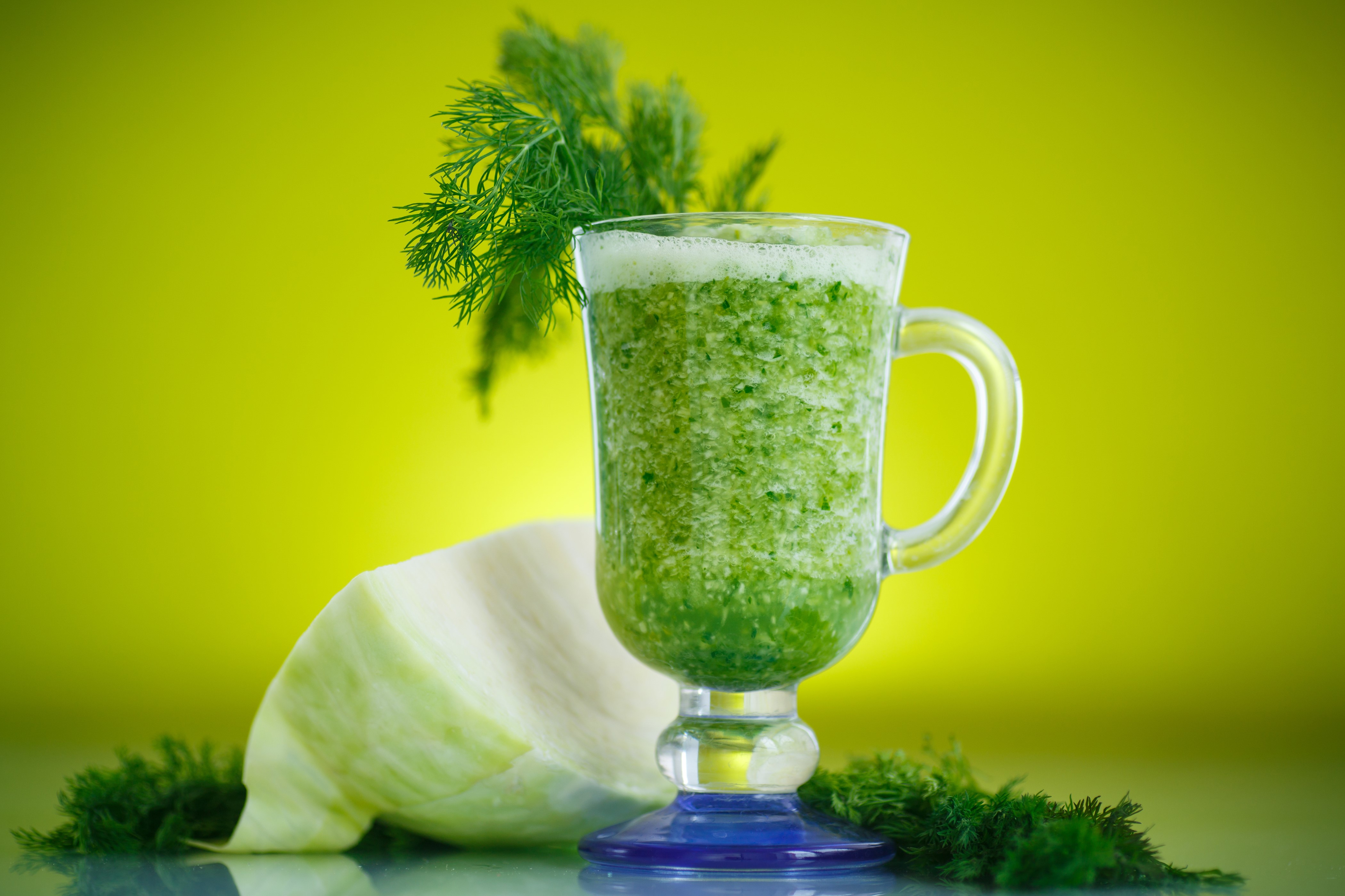 Green Cabbage and Dill Smoothie in a Glass Cup HD Wallpaper