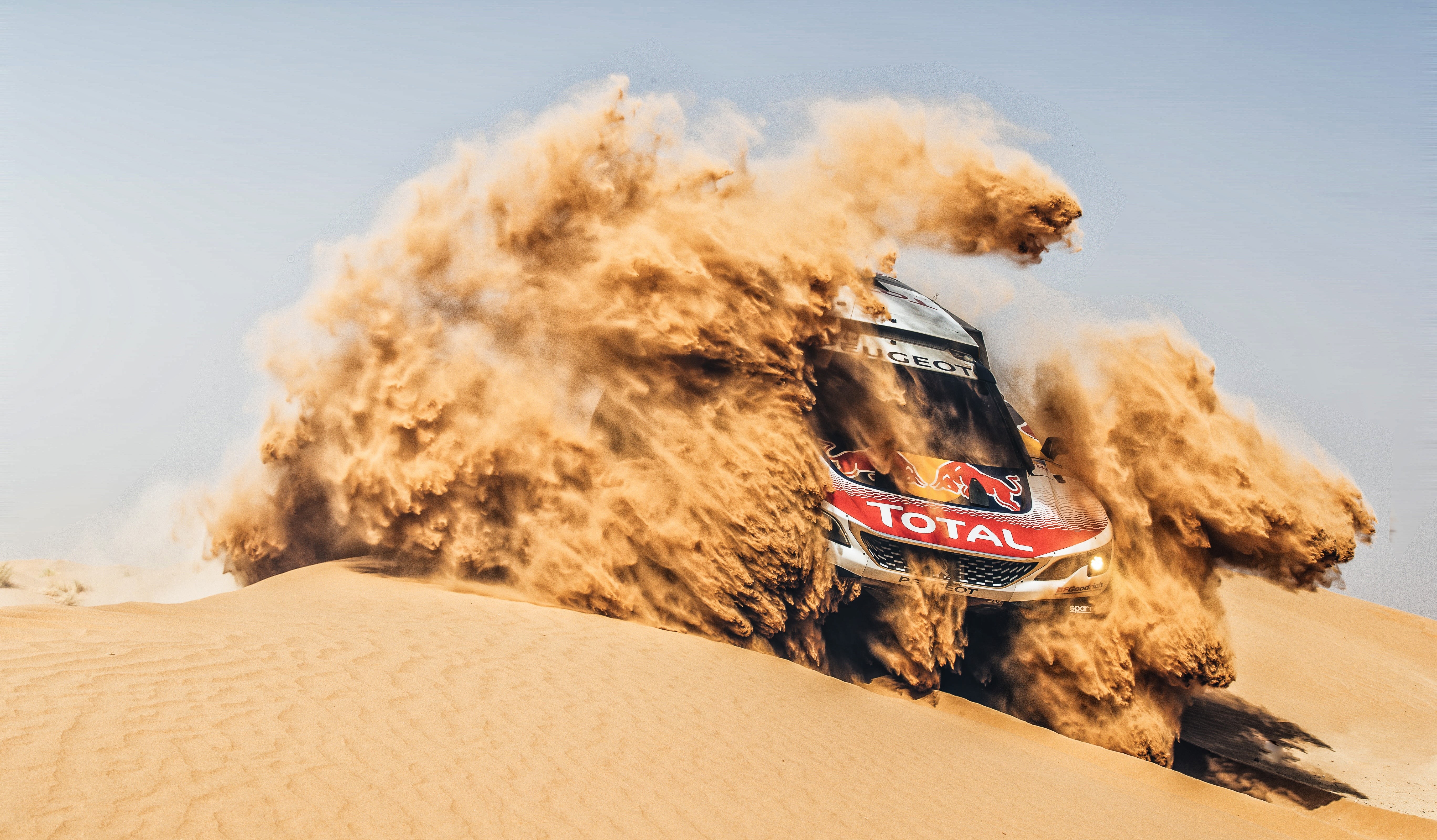 Peugeot rally car driving through sand HD Wallpaper