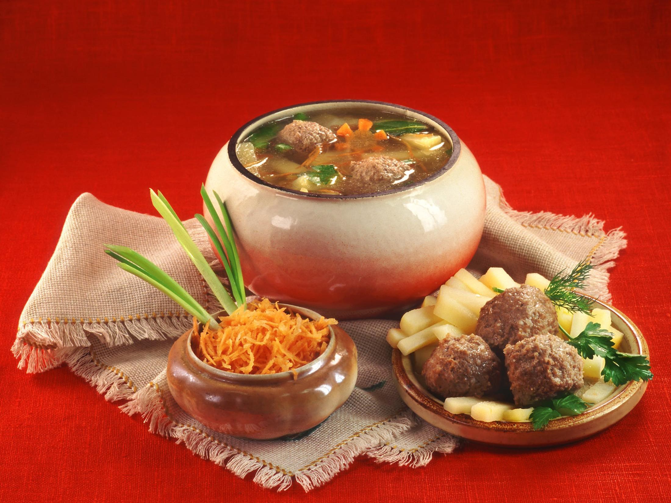 Soup with meatballs and shredded carrots HD Wallpaper