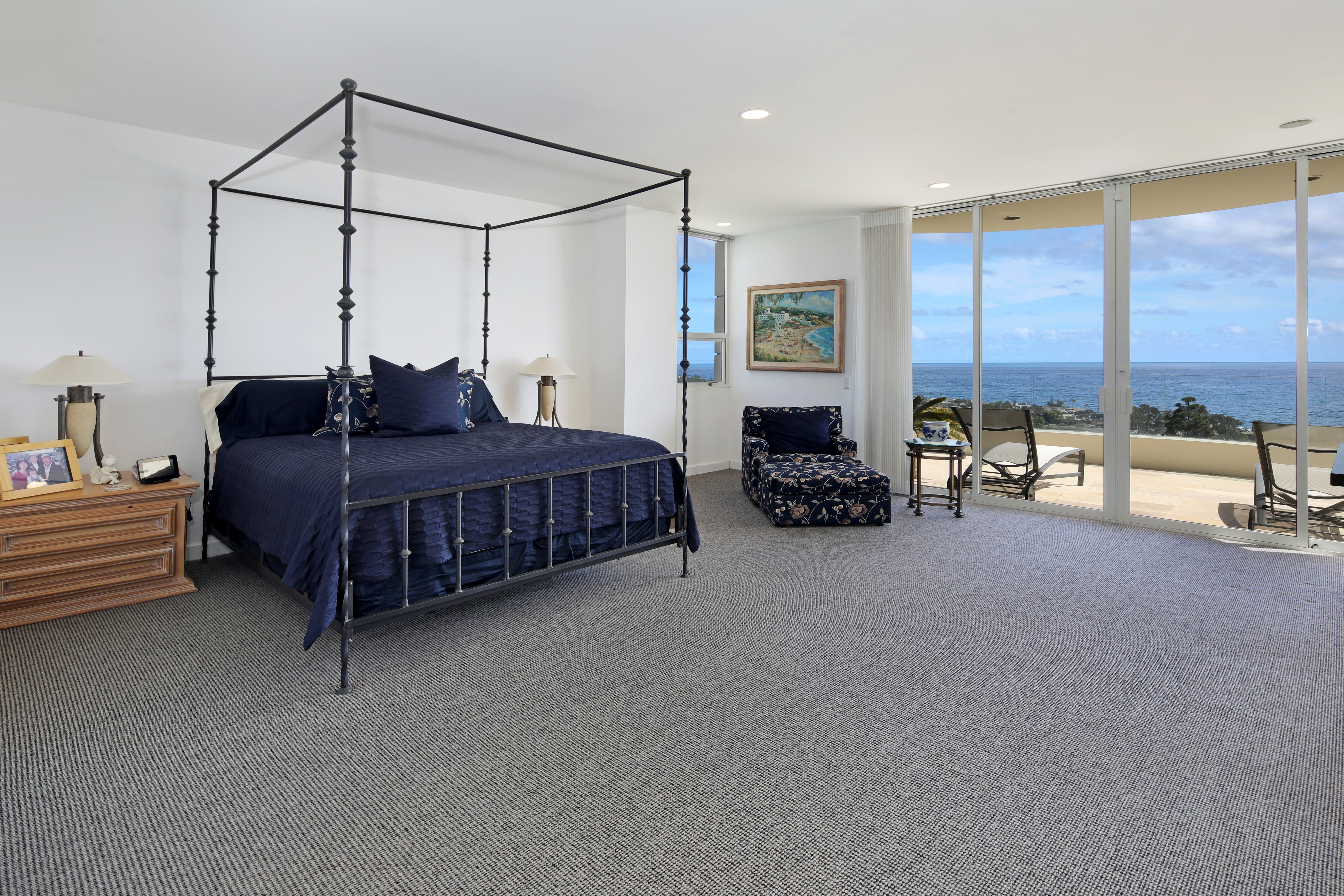 Bedroom with canopy bed and ocean view HD Wallpaper