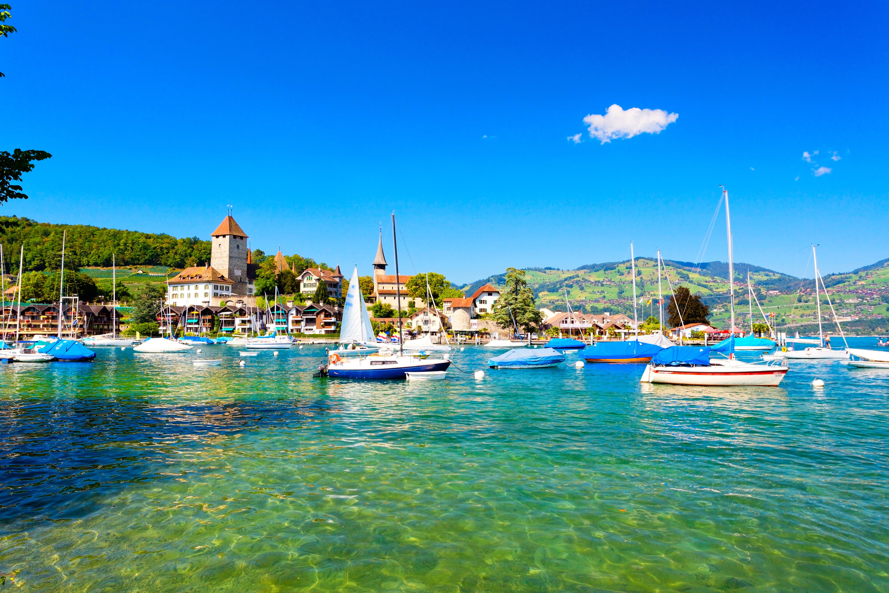 Boats on Lake Thun with Spiez Castle and Swiss Alps HD Wallpaper