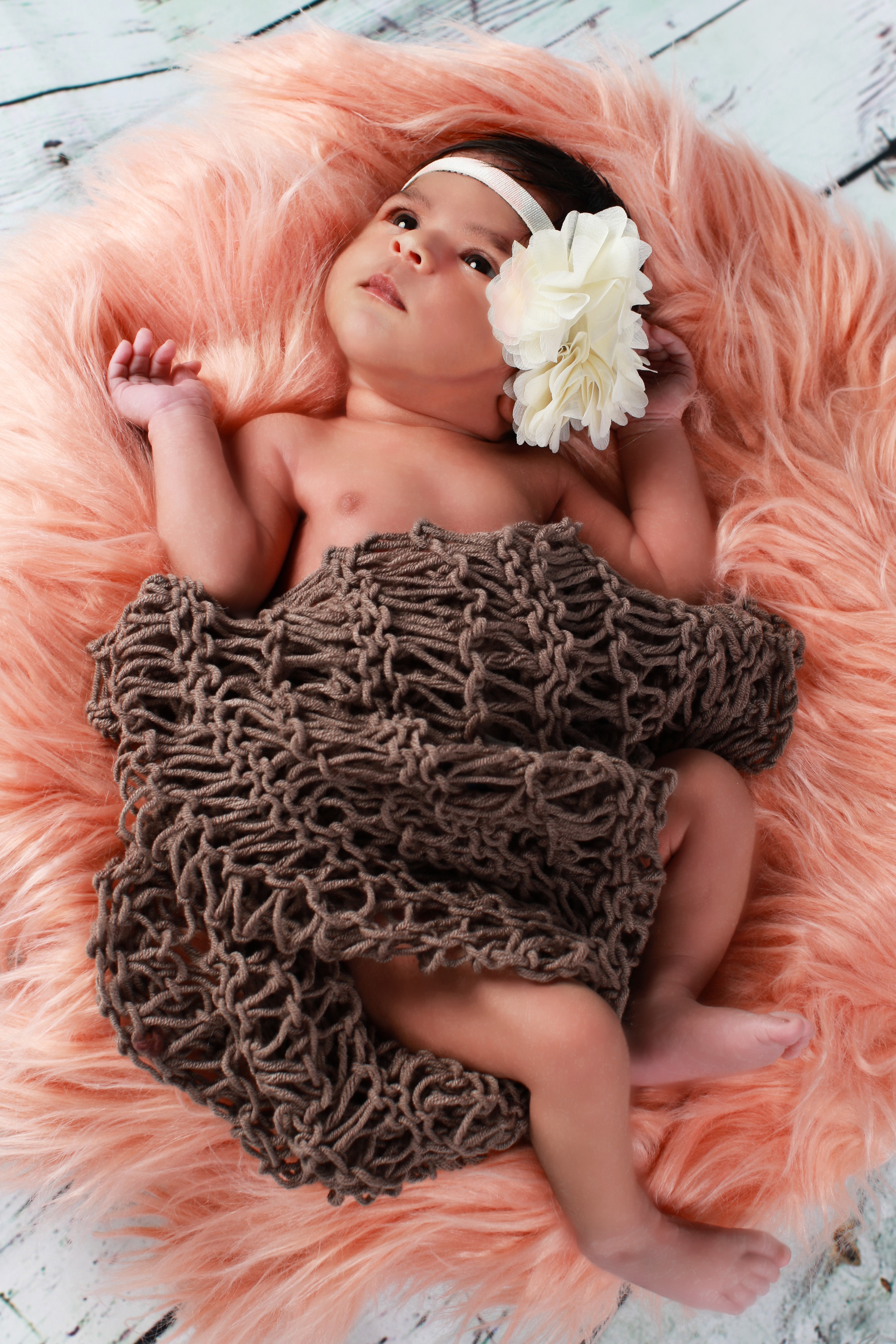 Newborn baby girl with flower headband HD Phone Wallpaper