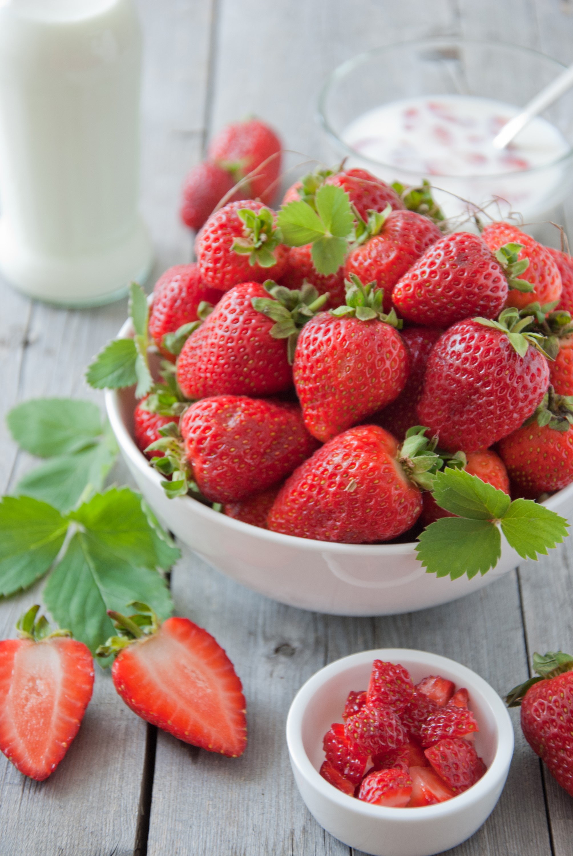 Bowl of Strawberries with Milk and Sliced Strawberries HD Phone Wallpaper