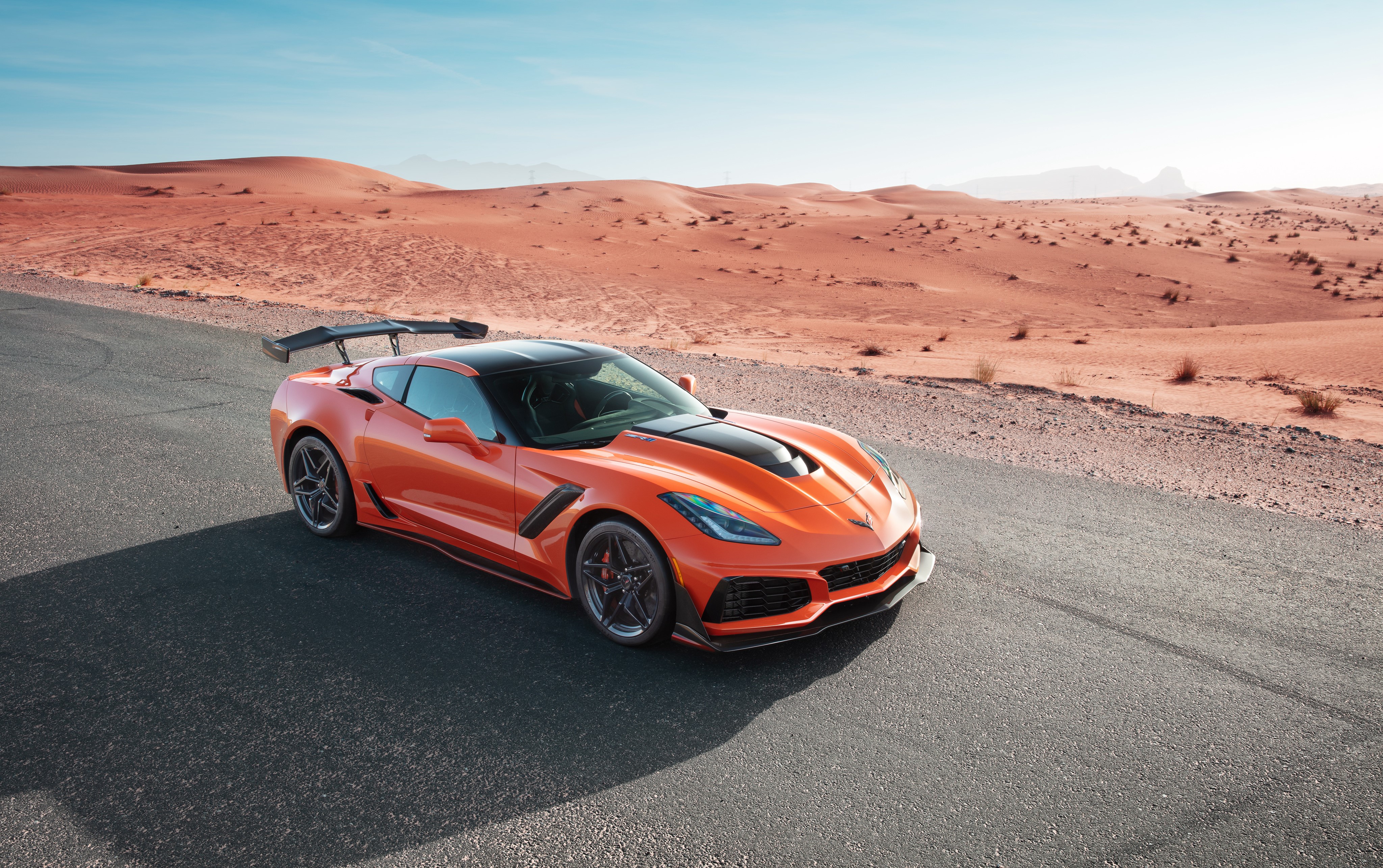 Orange 2019 Chevrolet Corvette ZR1 in desert HD Wallpaper