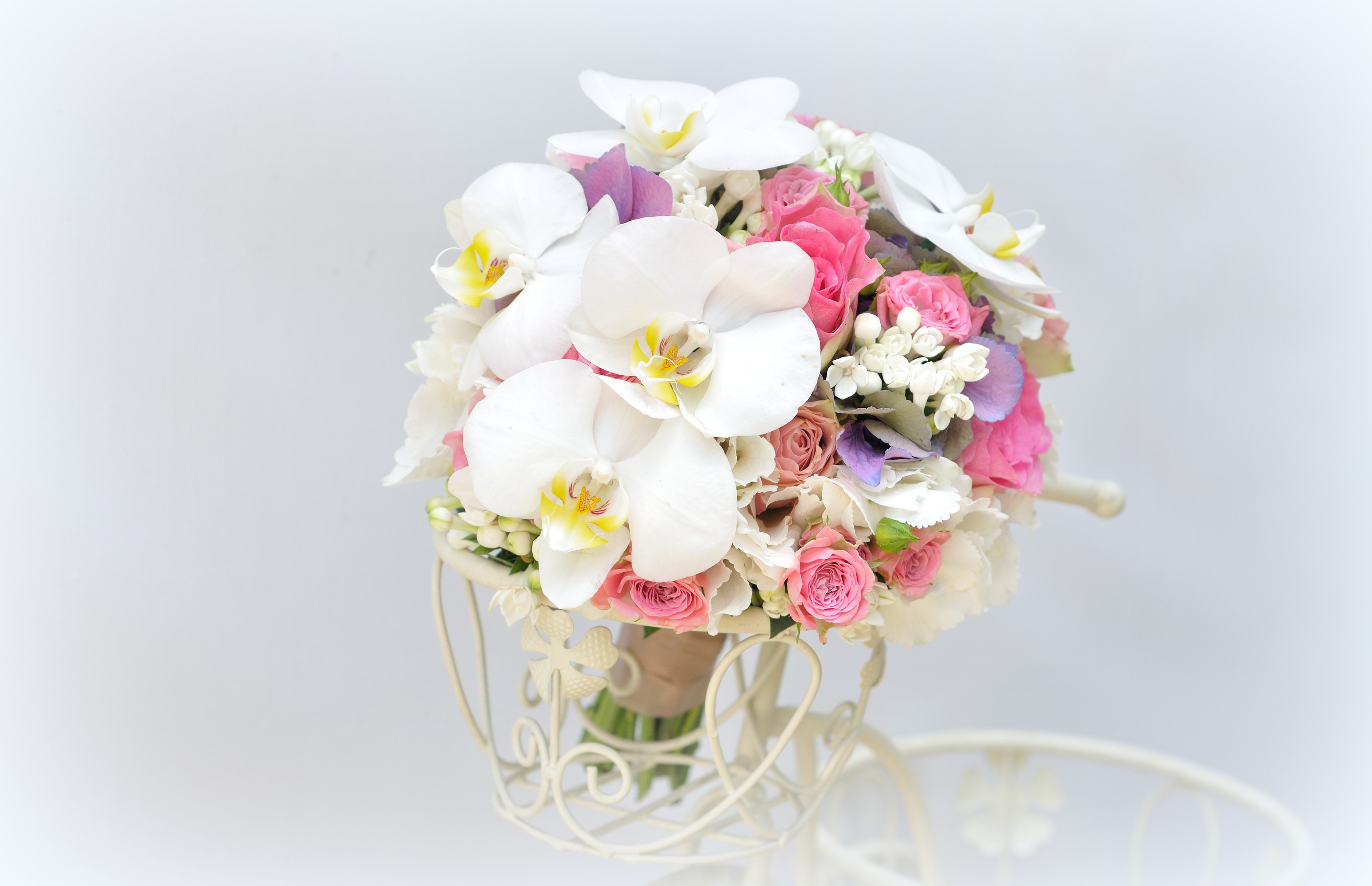 Bouquet of Orchids and Roses in a decorative stand HD Wallpaper