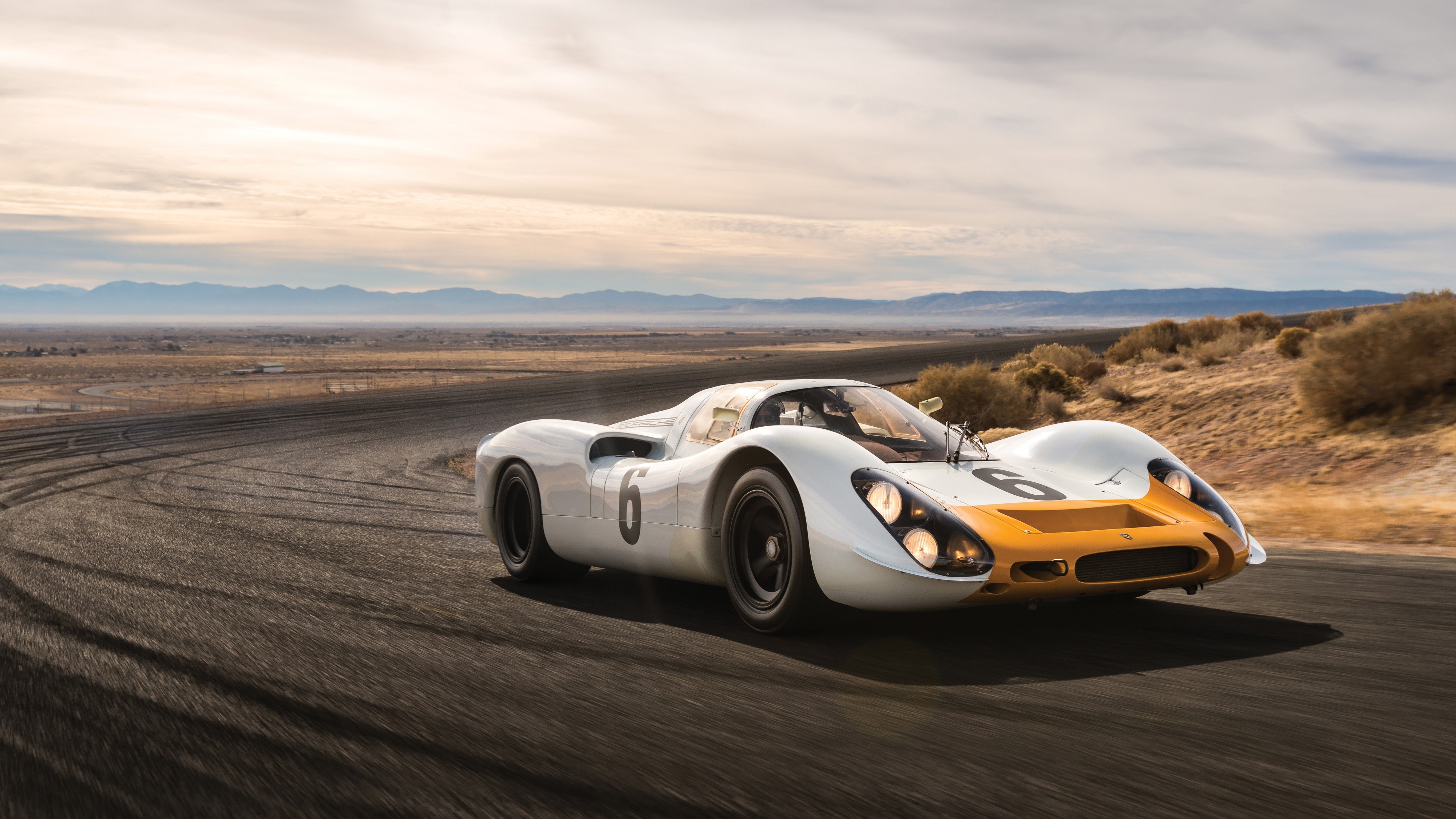 Porsche 908 Kurzheck race car on a track HD Wallpaper