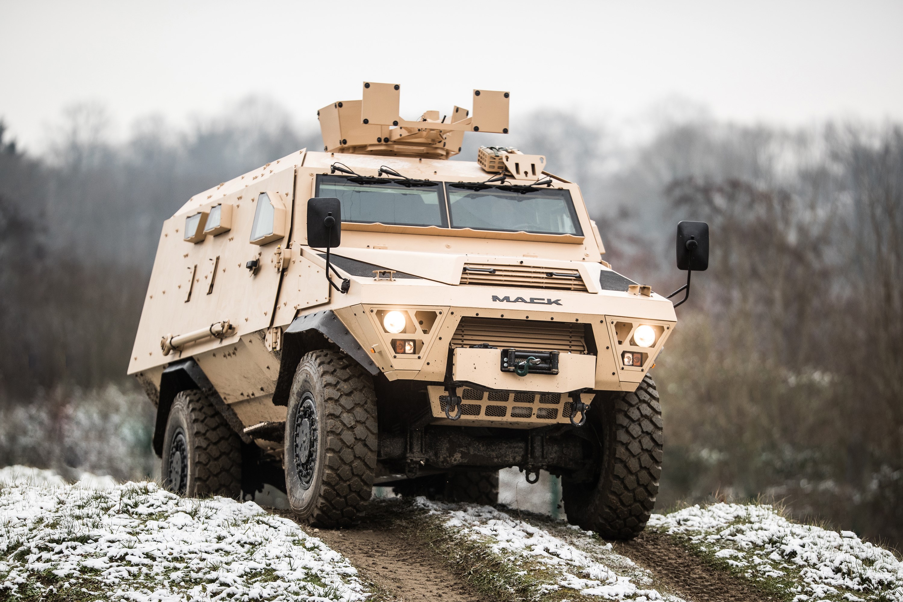 Arquus Bastion military vehicle on snowy terrain HD Wallpaper