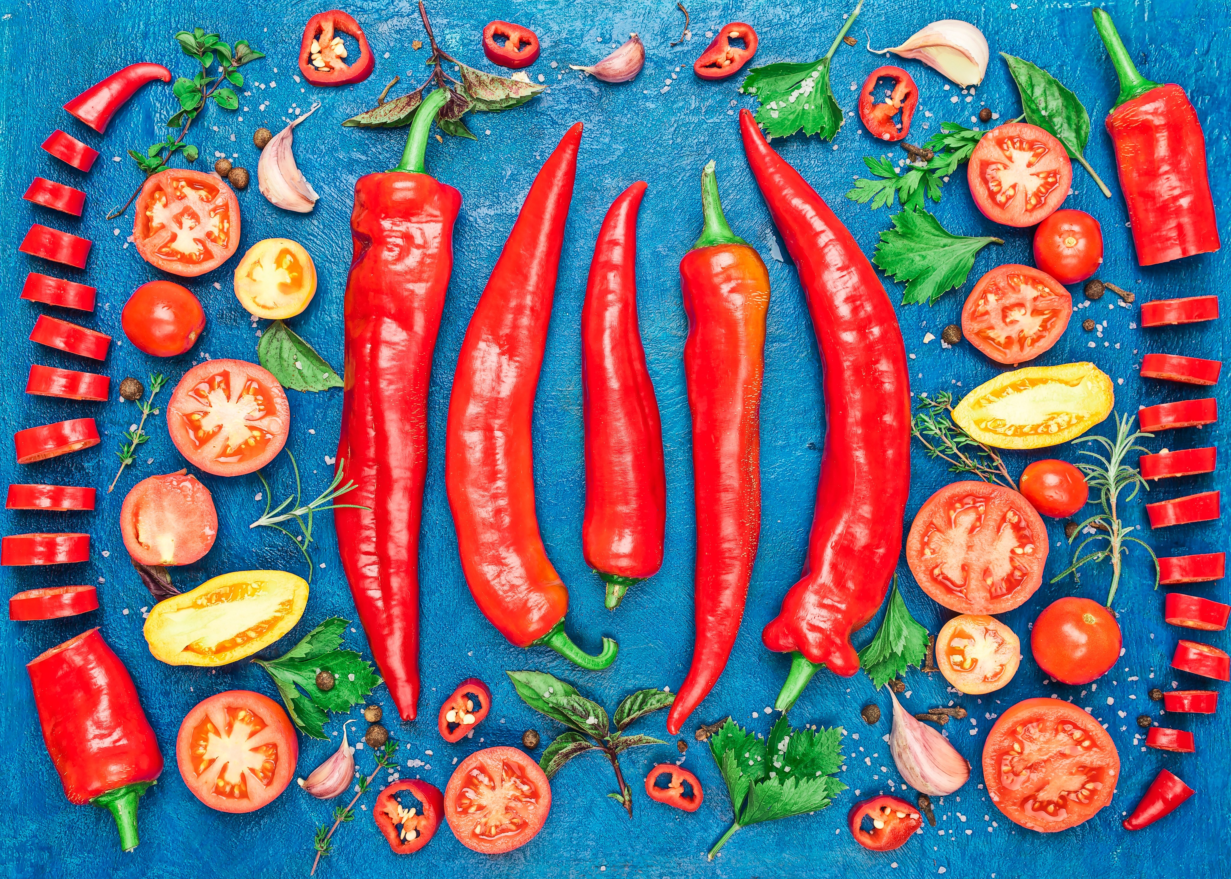 Red Chili Peppers, Tomatoes, and Garlic on Blue Background HD Wallpaper