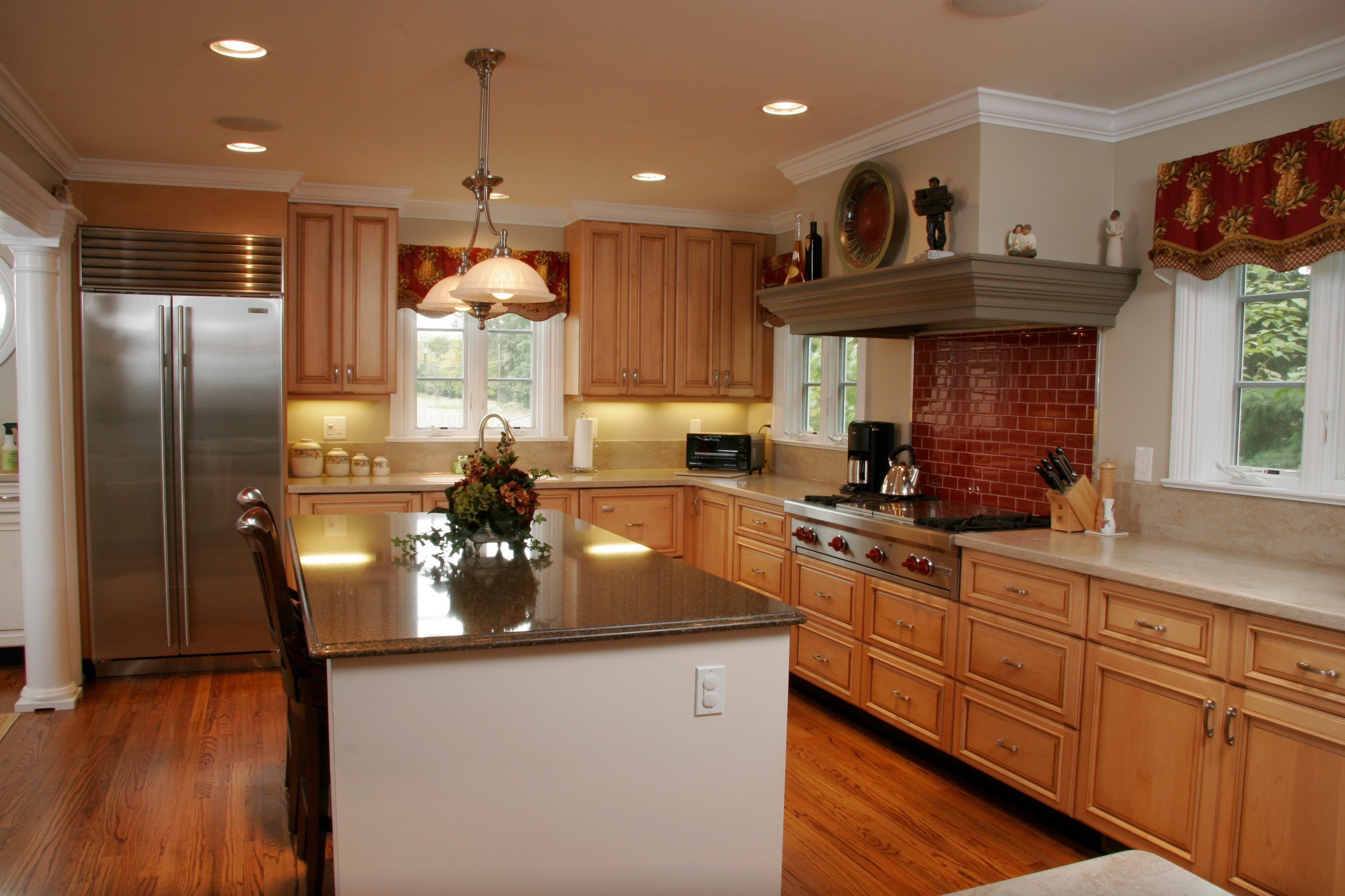 Kitchen with island, refrigerator, and cabinets HD Wallpaper