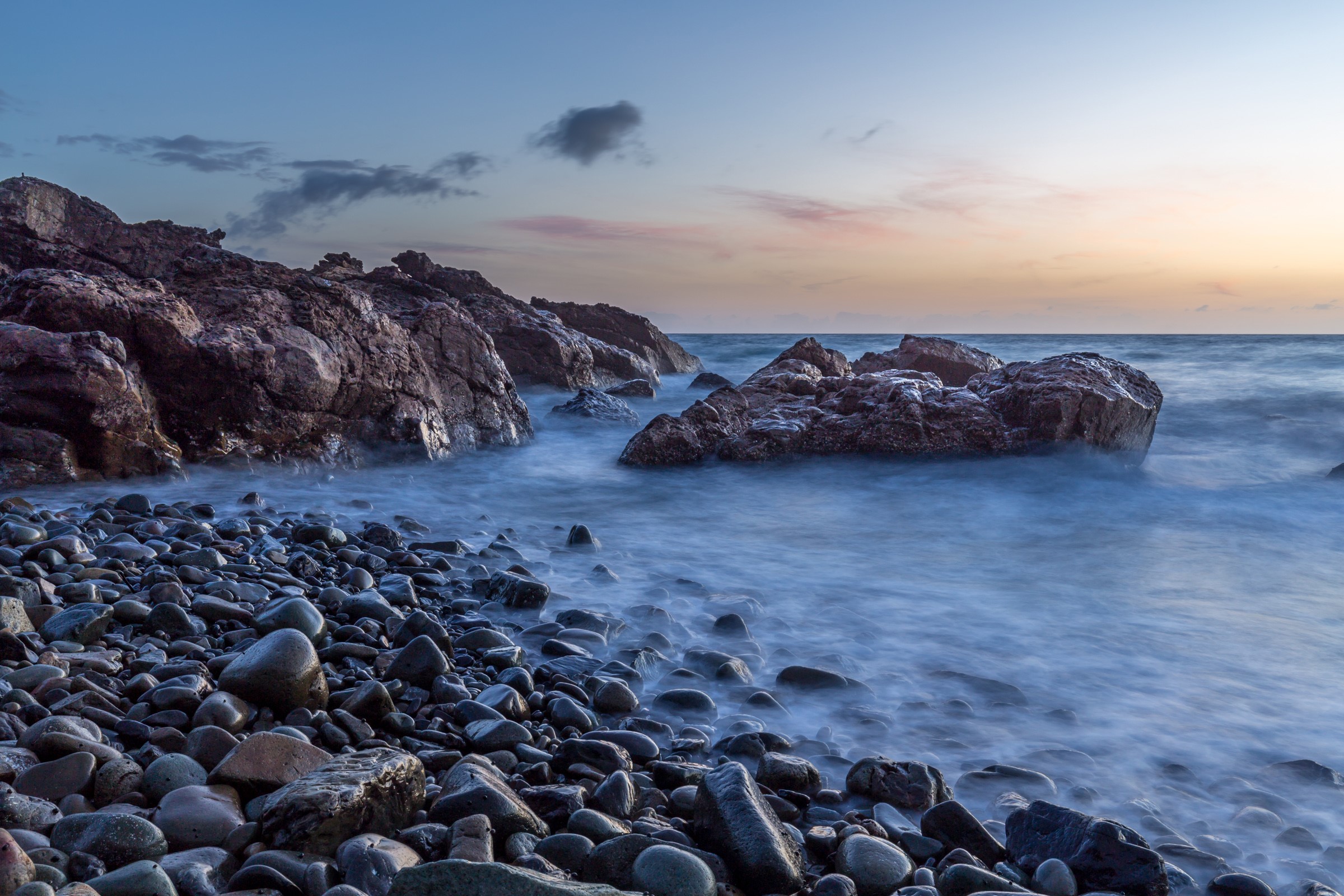 Rocky Coastline at Sunset in Waitoitoi, New Zealand HD Wallpaper