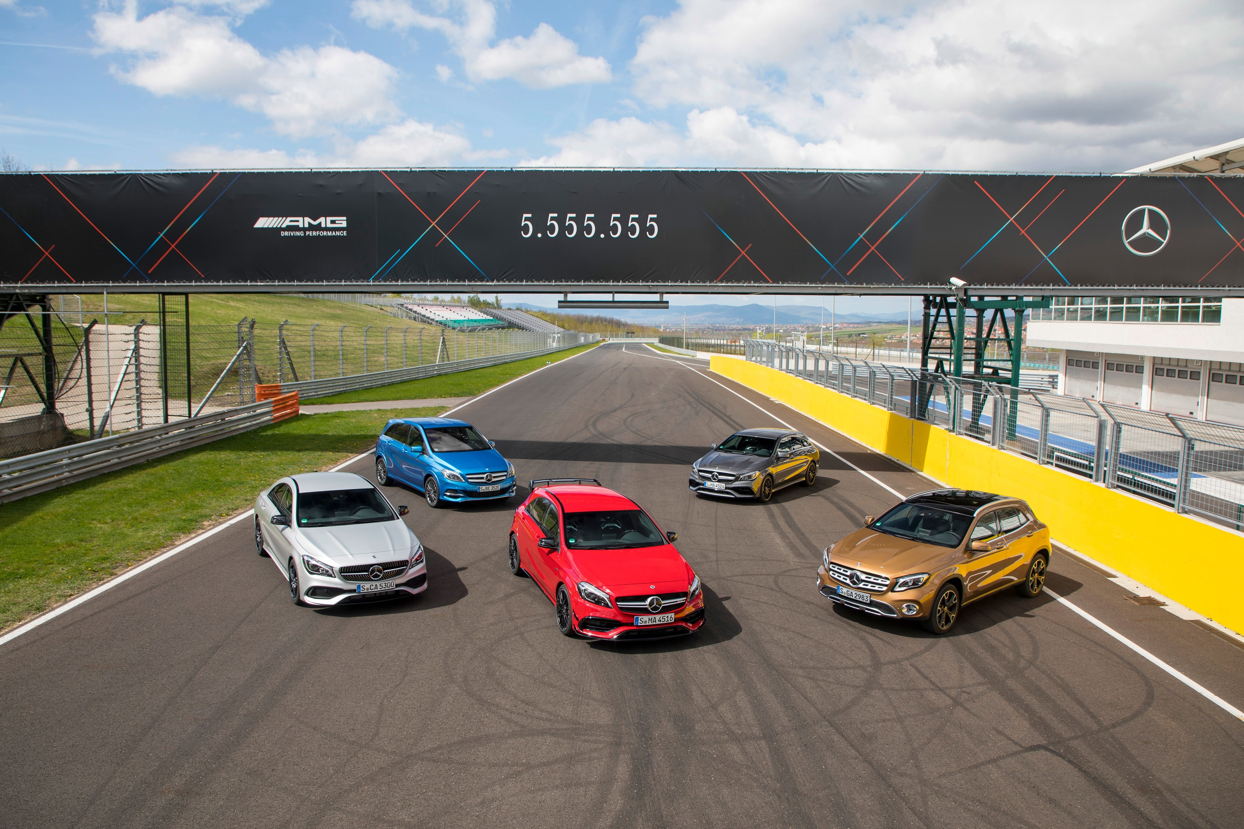 Mercedes-Benz AMG cars on a race track HD Wallpaper