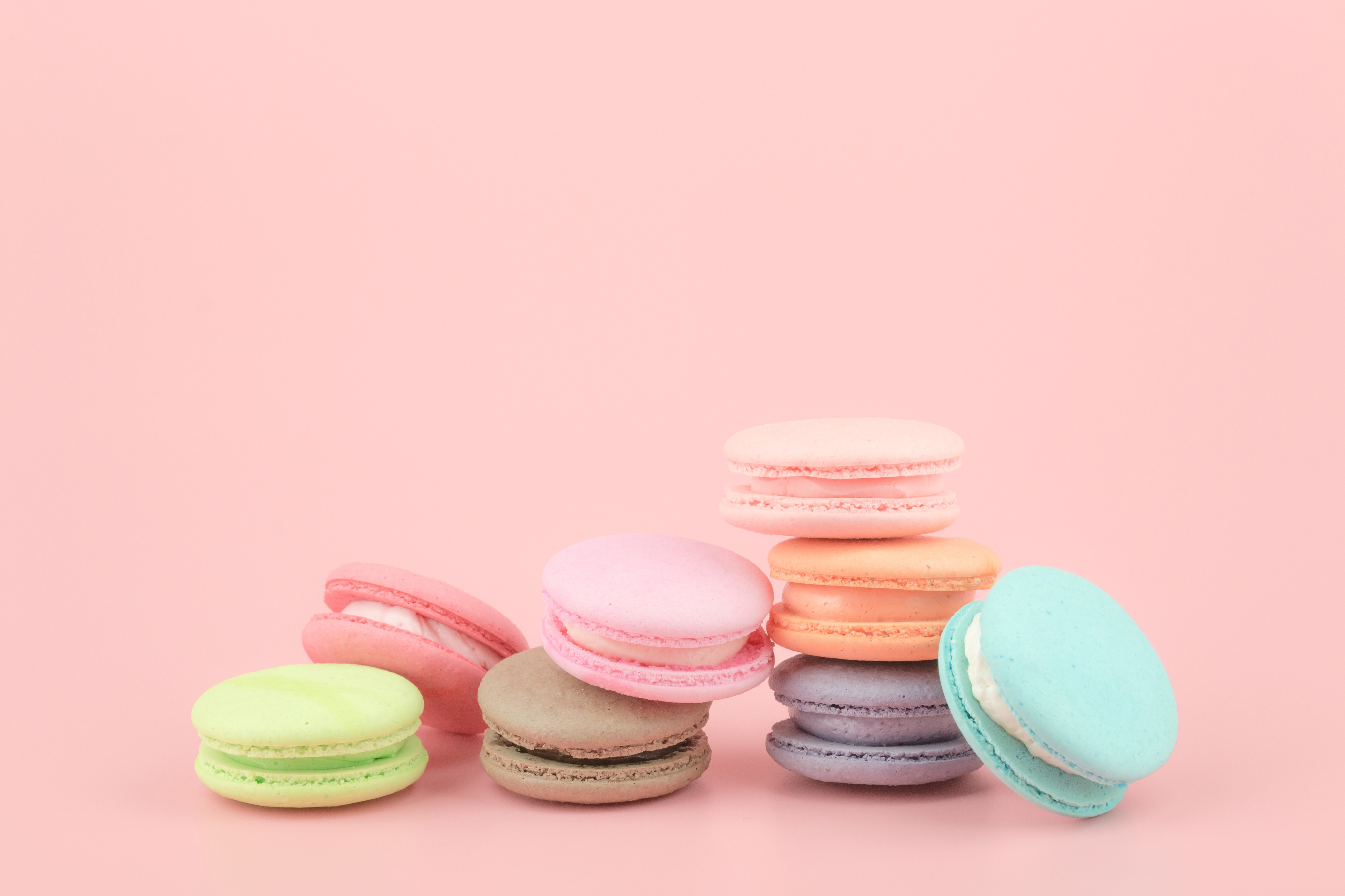 Macarons on a pink background HD Wallpaper