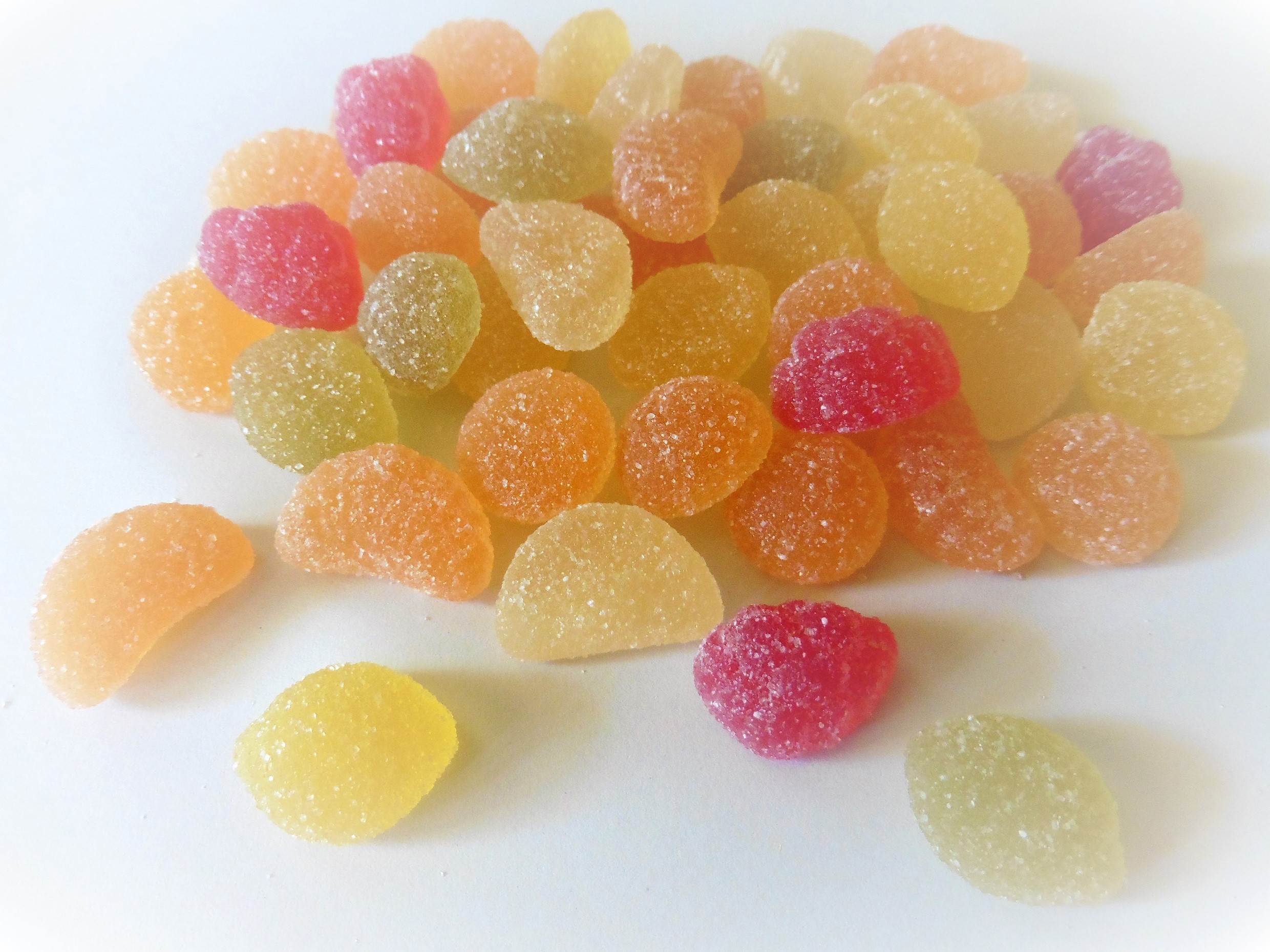 Assortment of colorful fruit jellies HD Wallpaper