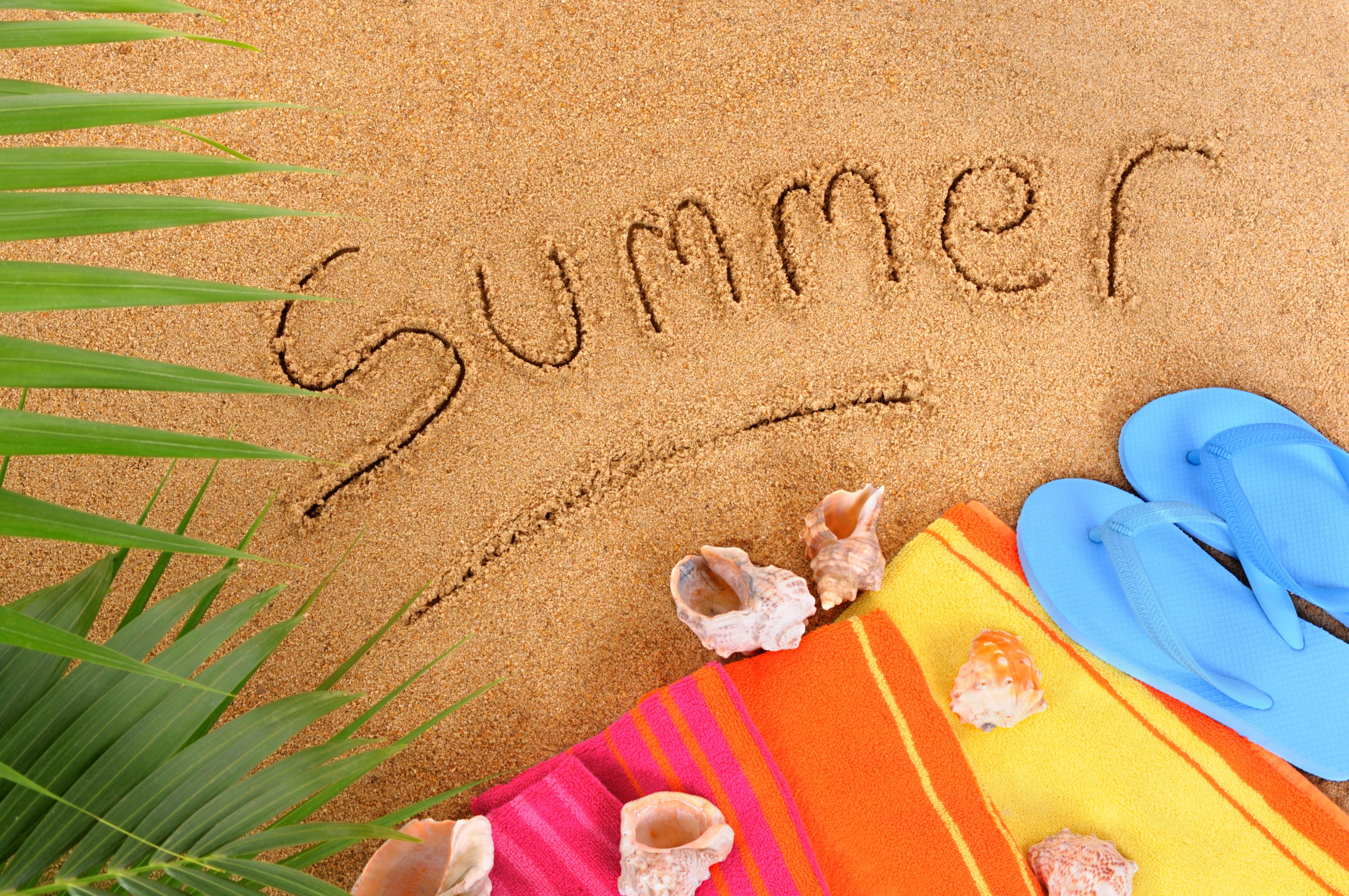 Summer written in sand with beach items HD Wallpaper