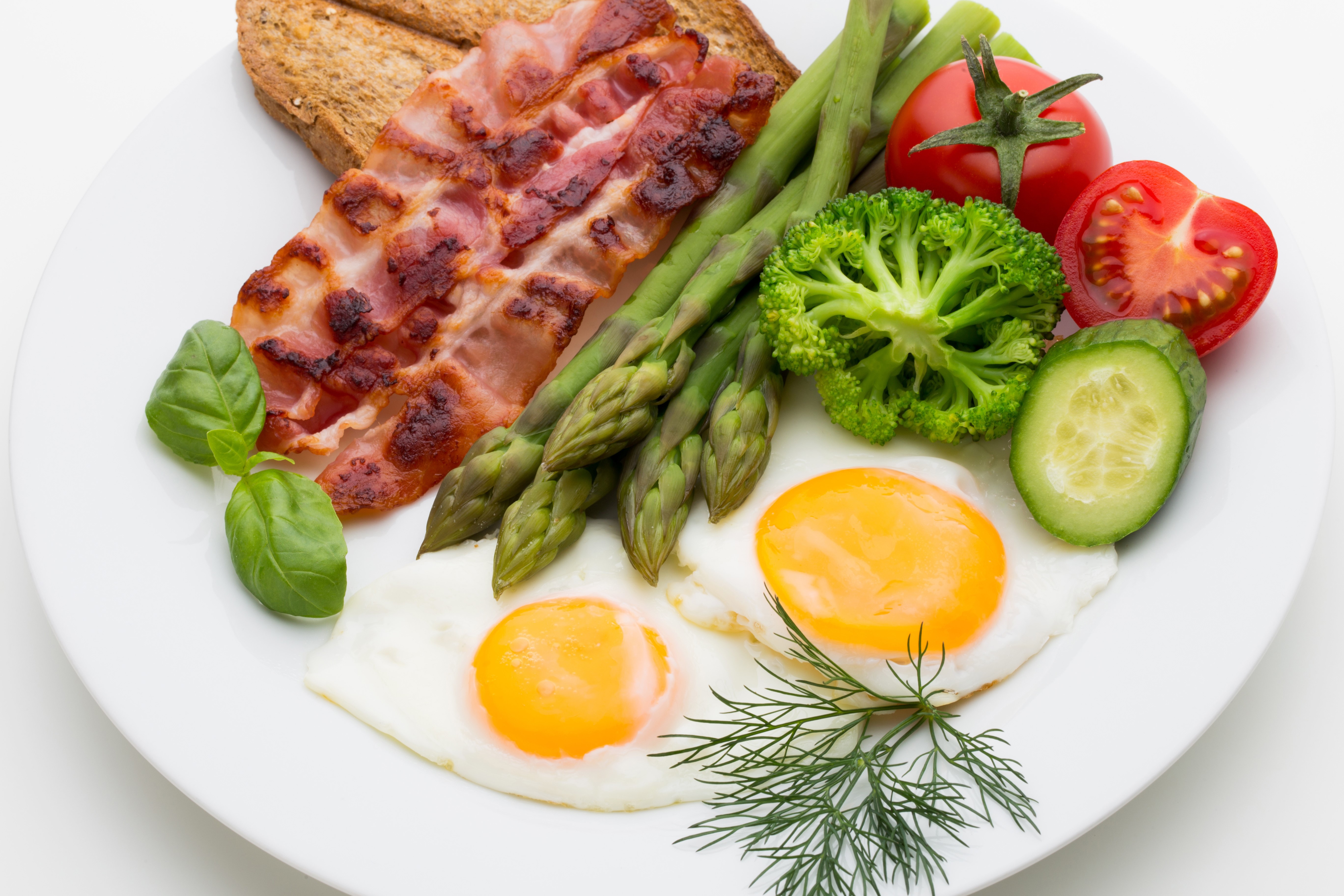 Fried eggs with bacon, toast, and vegetables HD Wallpaper