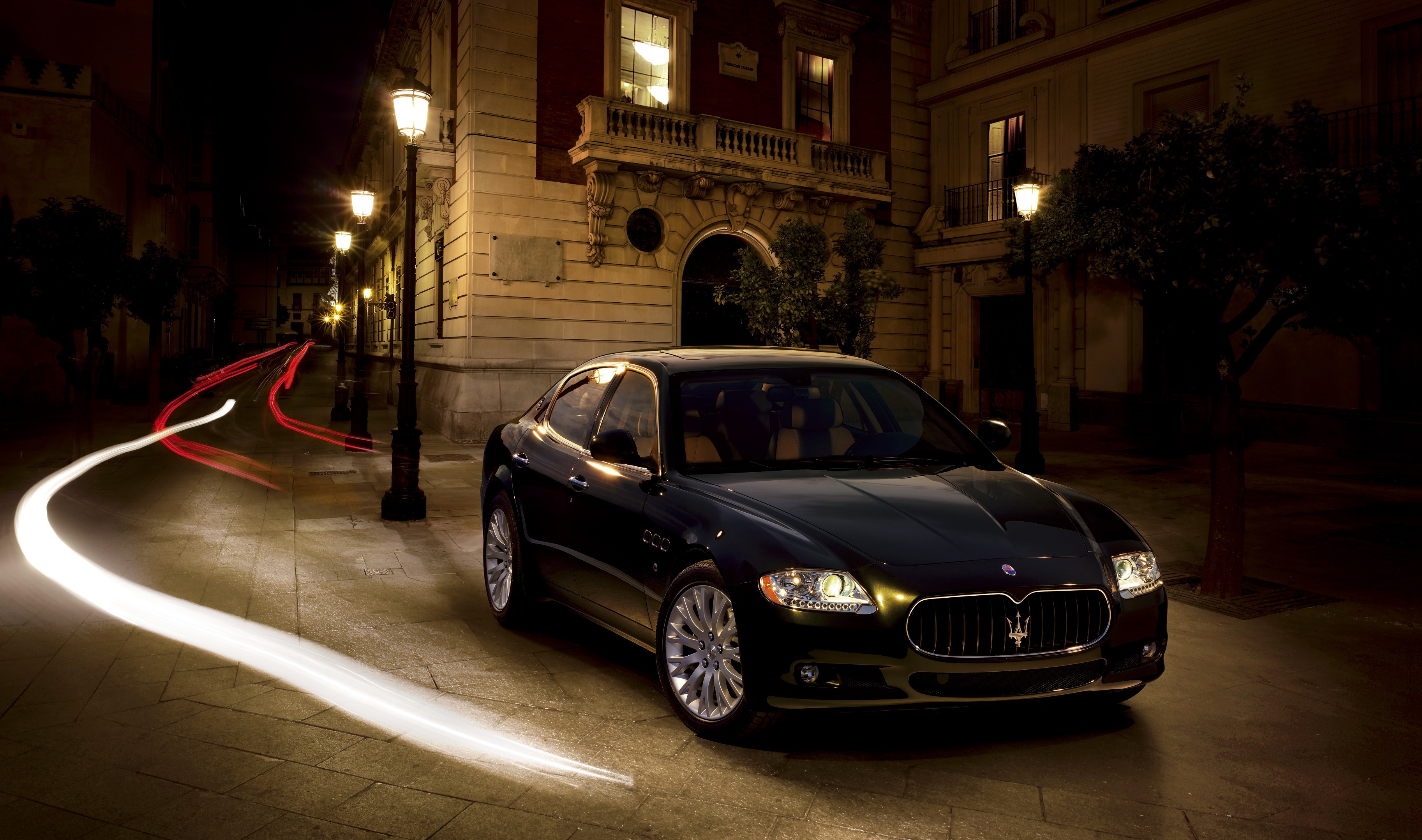 Maserati Quattroporte sedan on a street at night HD Wallpaper
