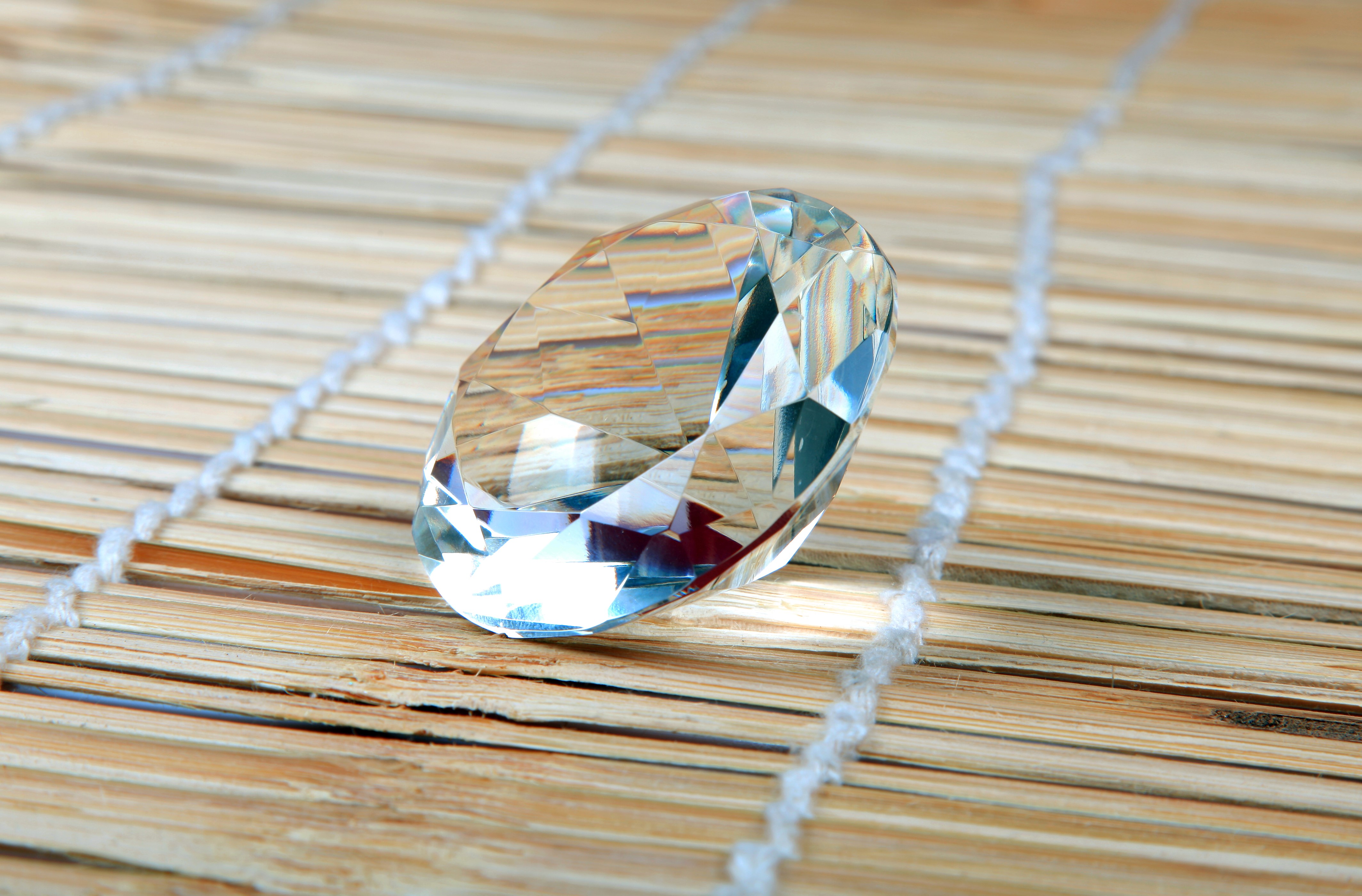Brilliant diamond on a bamboo mat HD Wallpaper
